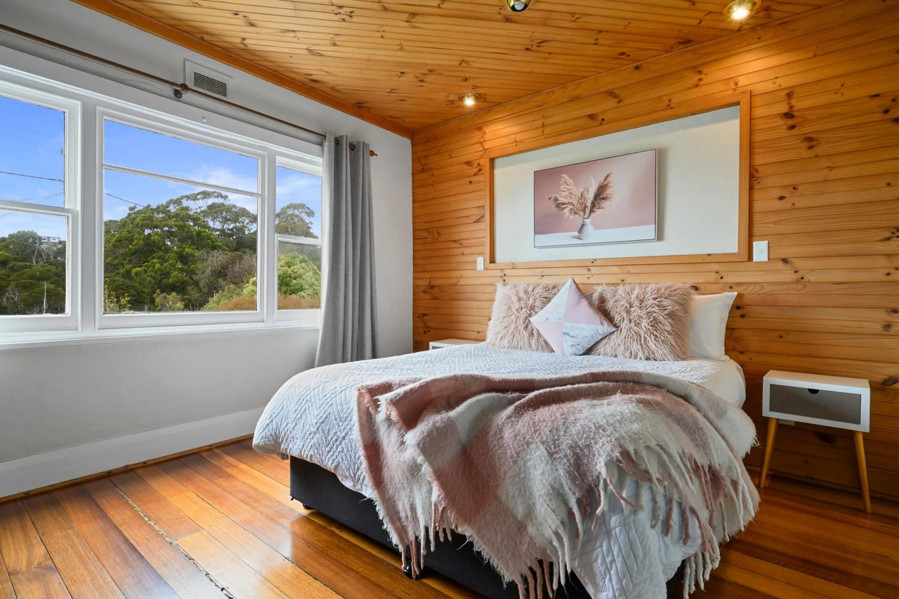 Bed in Burnie City Apartments