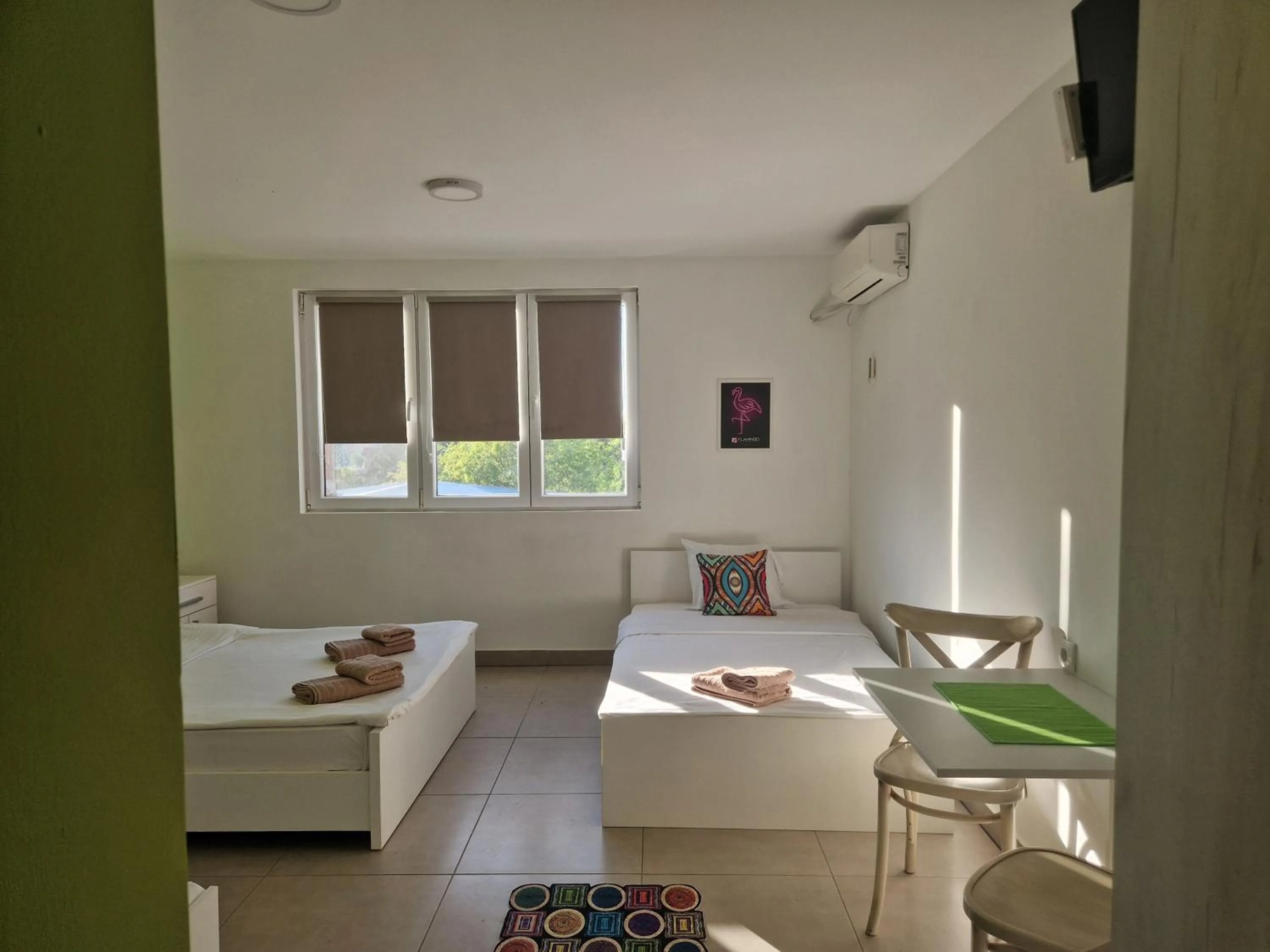 Photo of the whole room, Bed in Flamingo Resort