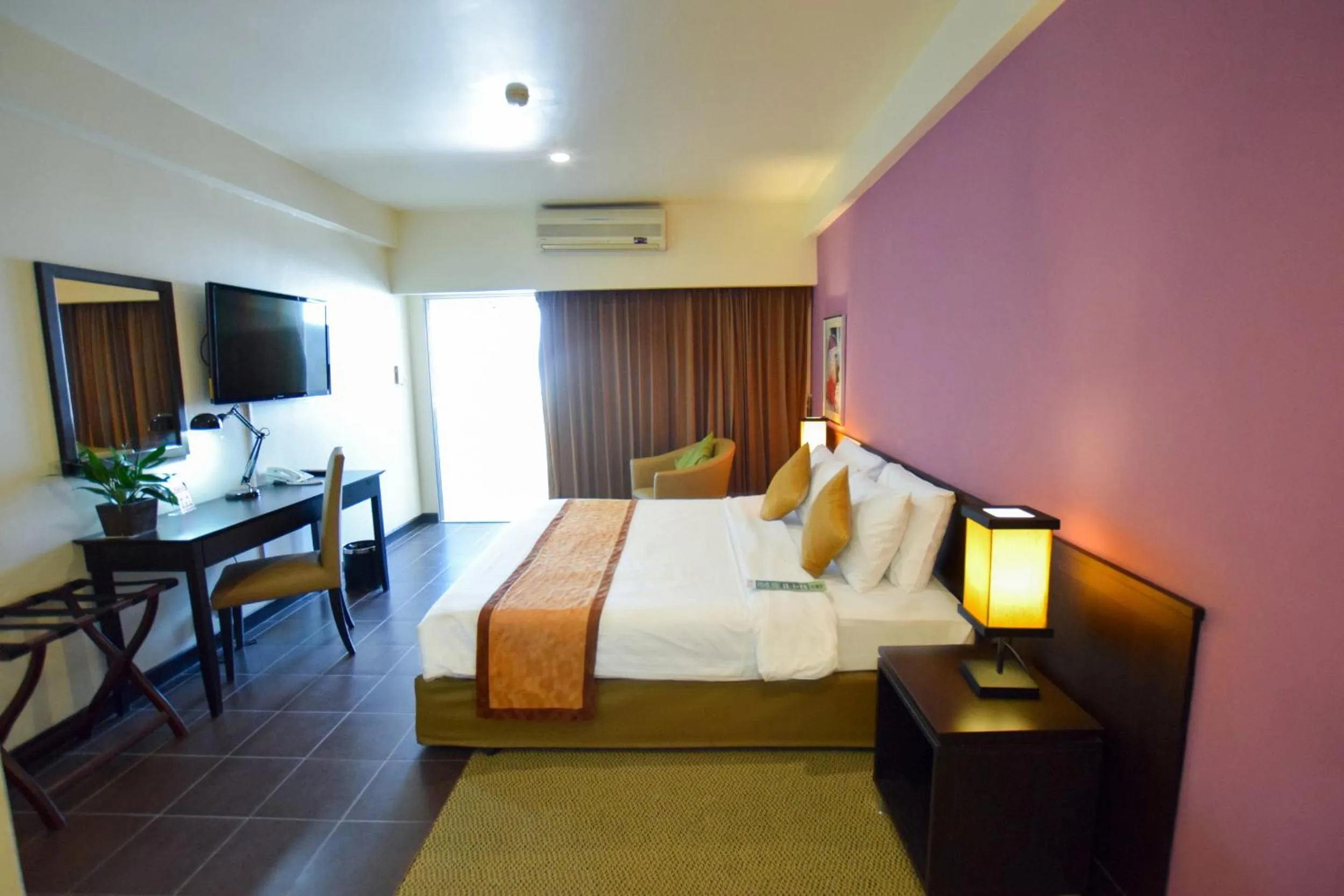 Photo of the whole room, Bed in The Color Living Hotel