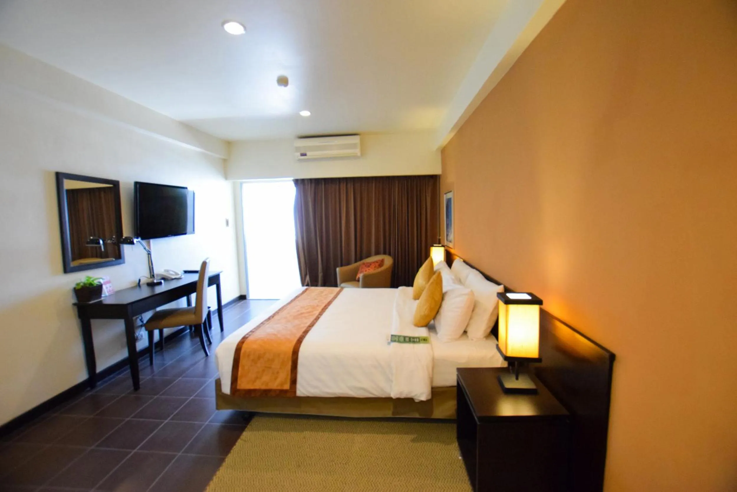 Photo of the whole room, Bed in The Color Living Hotel