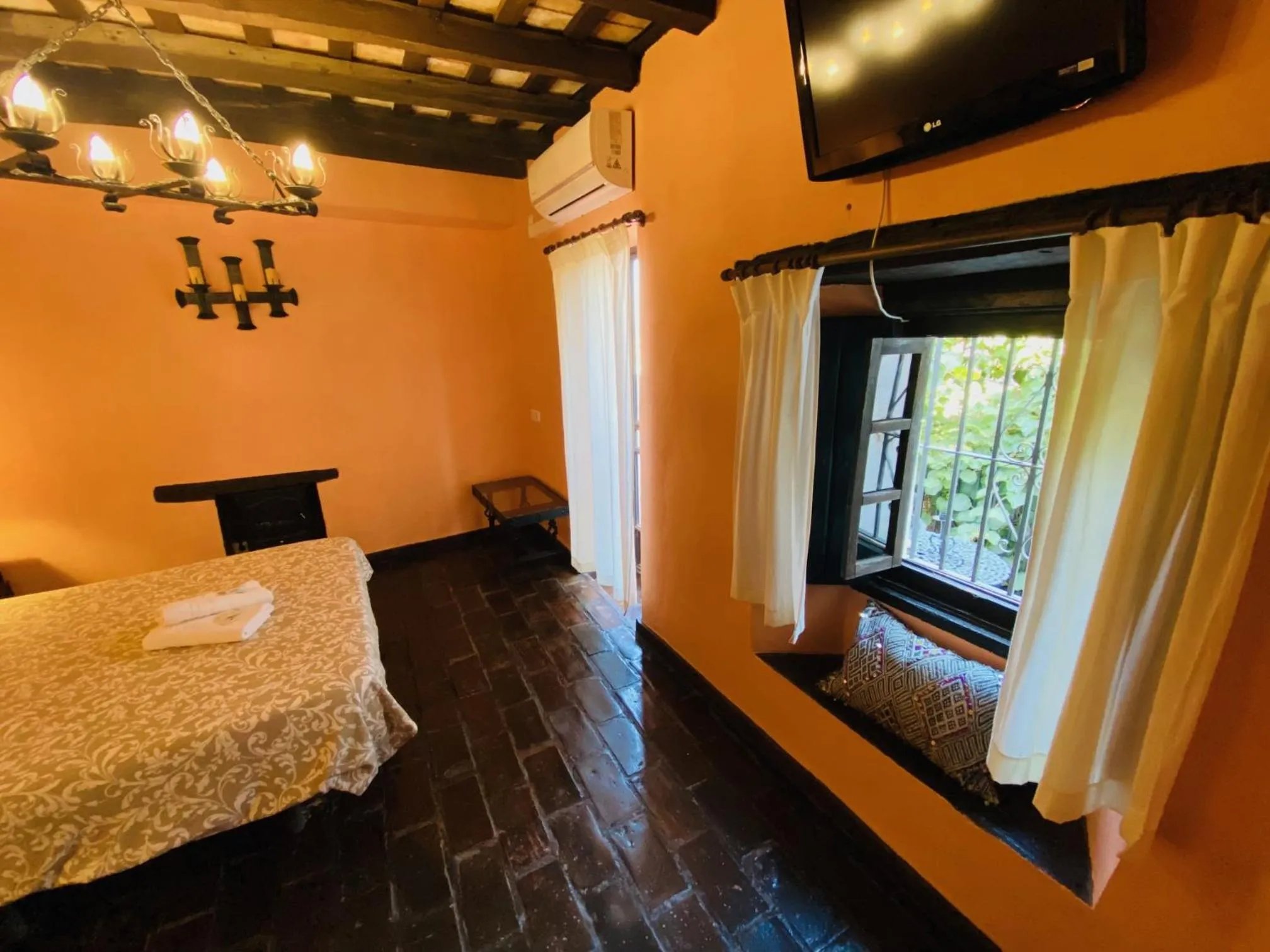 TV and multimedia, Bed in Posada La Casa Grande