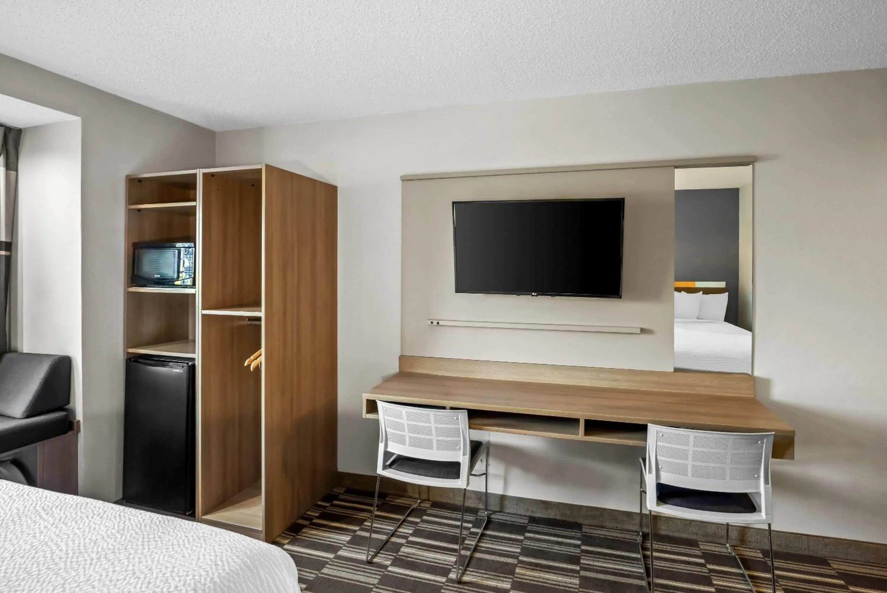 Bed in Microtel Inn by Wyndham Greensboro