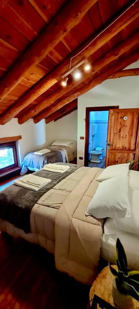 Bed in Agriturismo del Cimone