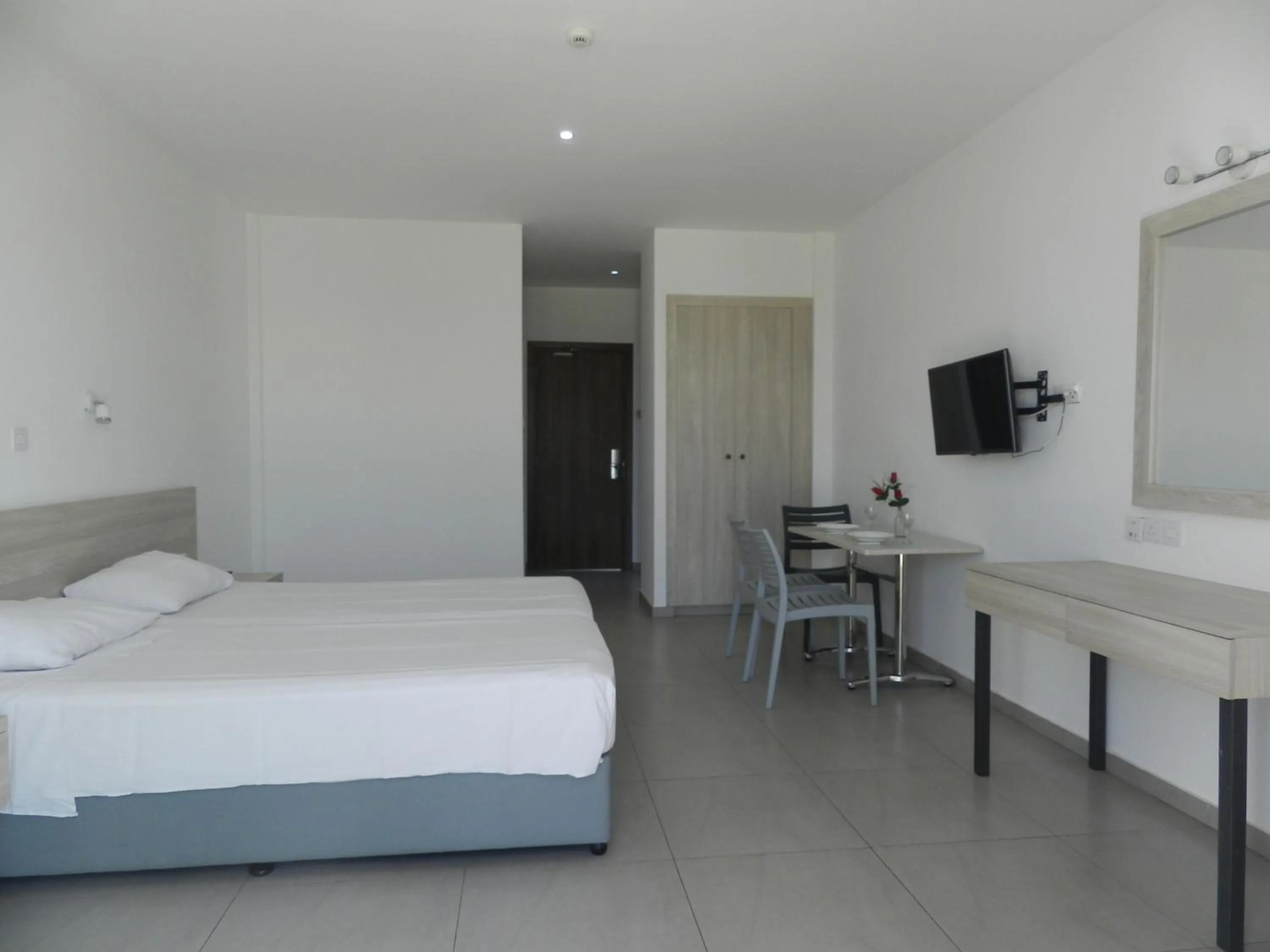 Bed in Evabelle Napa Hotel Apartments