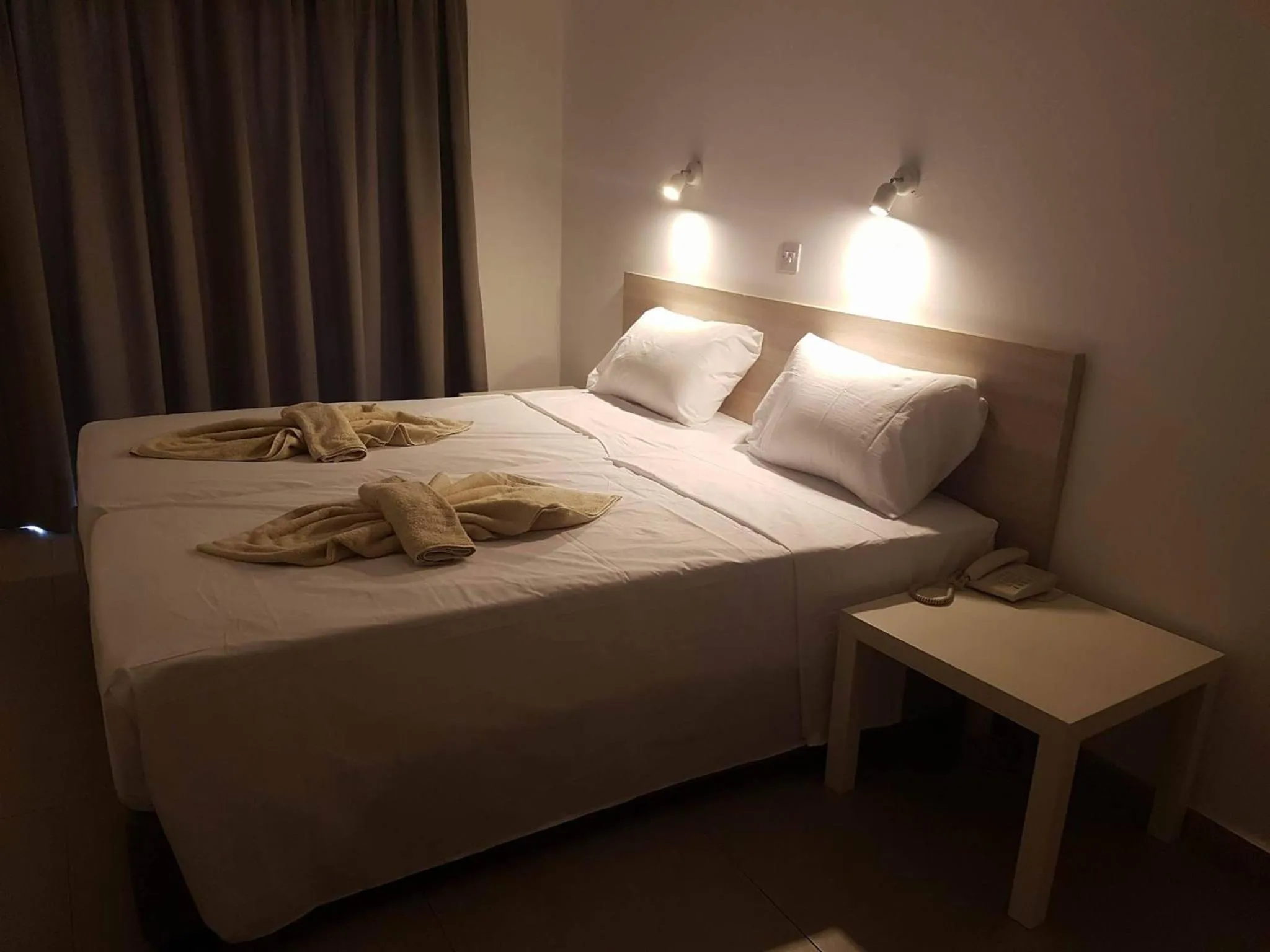 Bed in Evabelle Napa Hotel Apartments