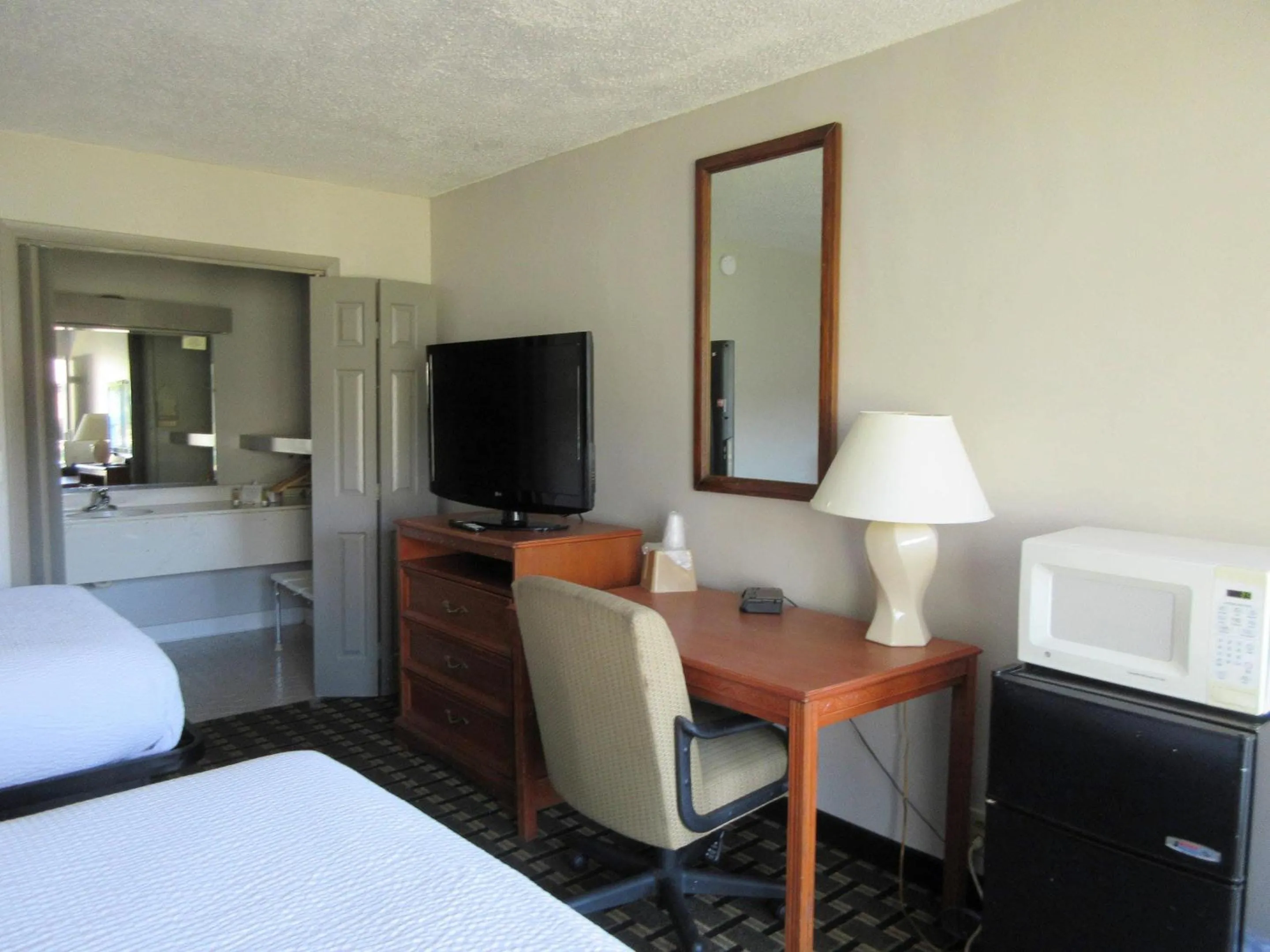 Bedroom, Bed in Clarion Inn Southern Pines - Pinehurst