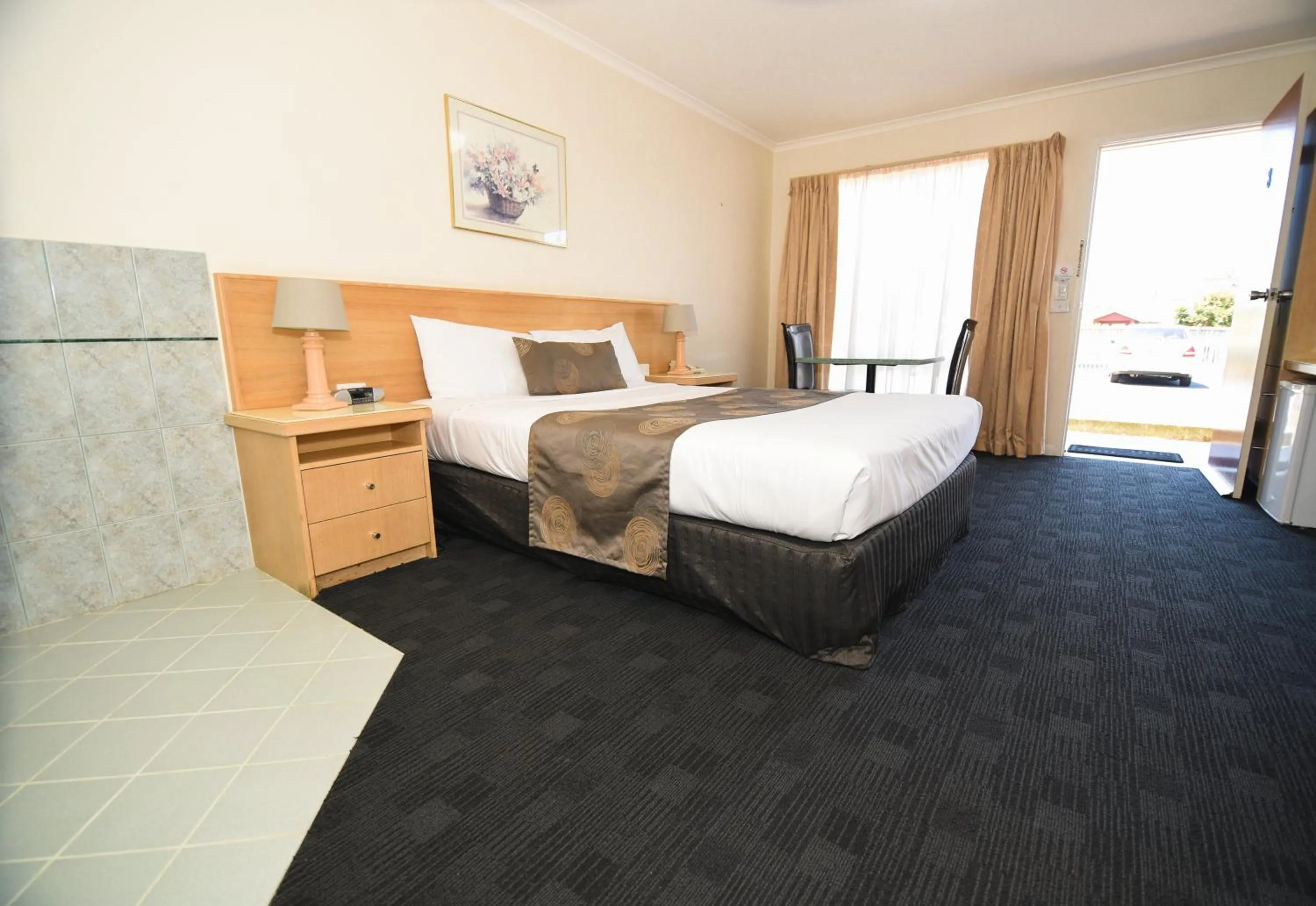 Bed in Sandown Heritage Motel