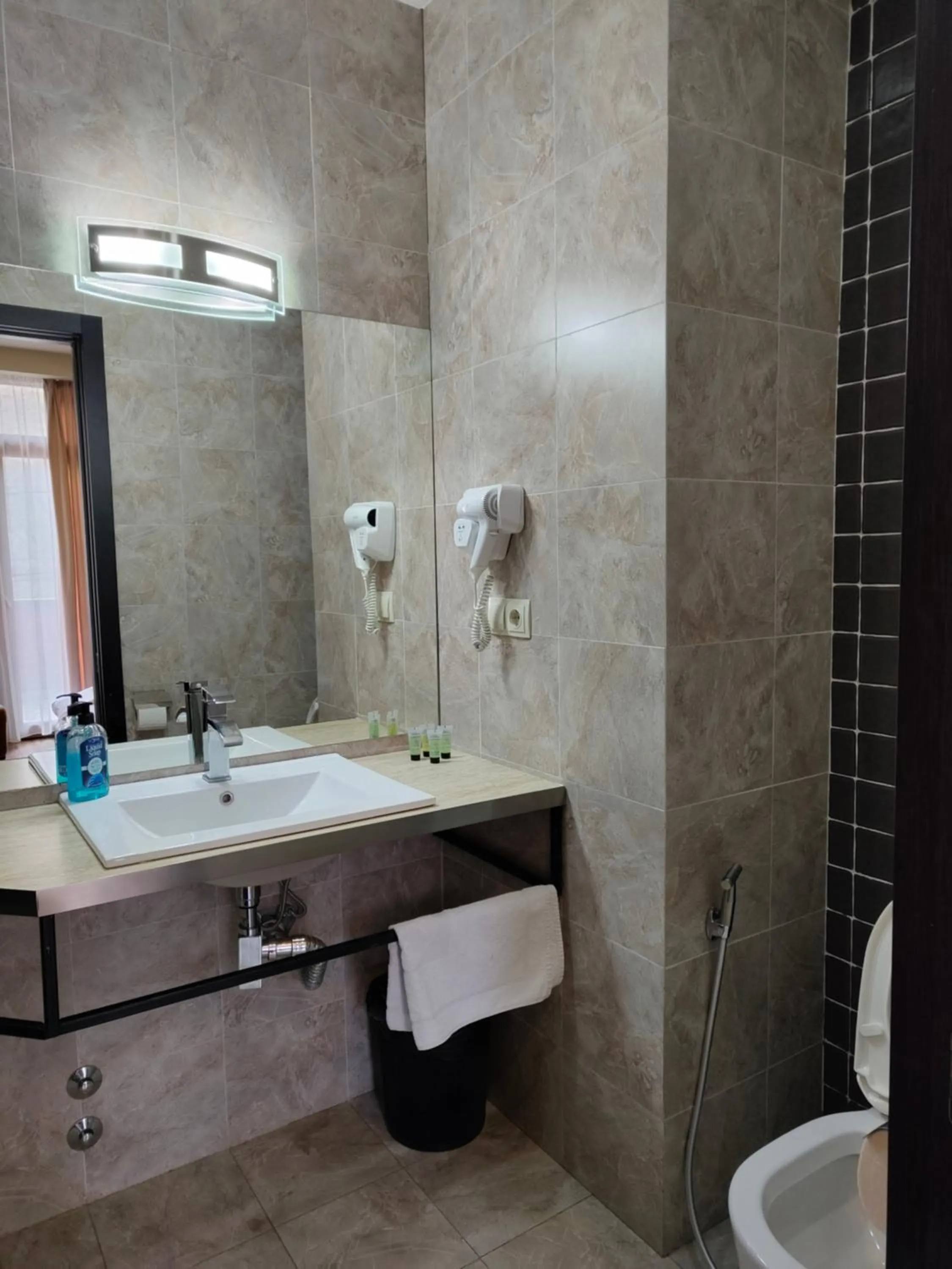 Bathroom in Sani Apart Hotel