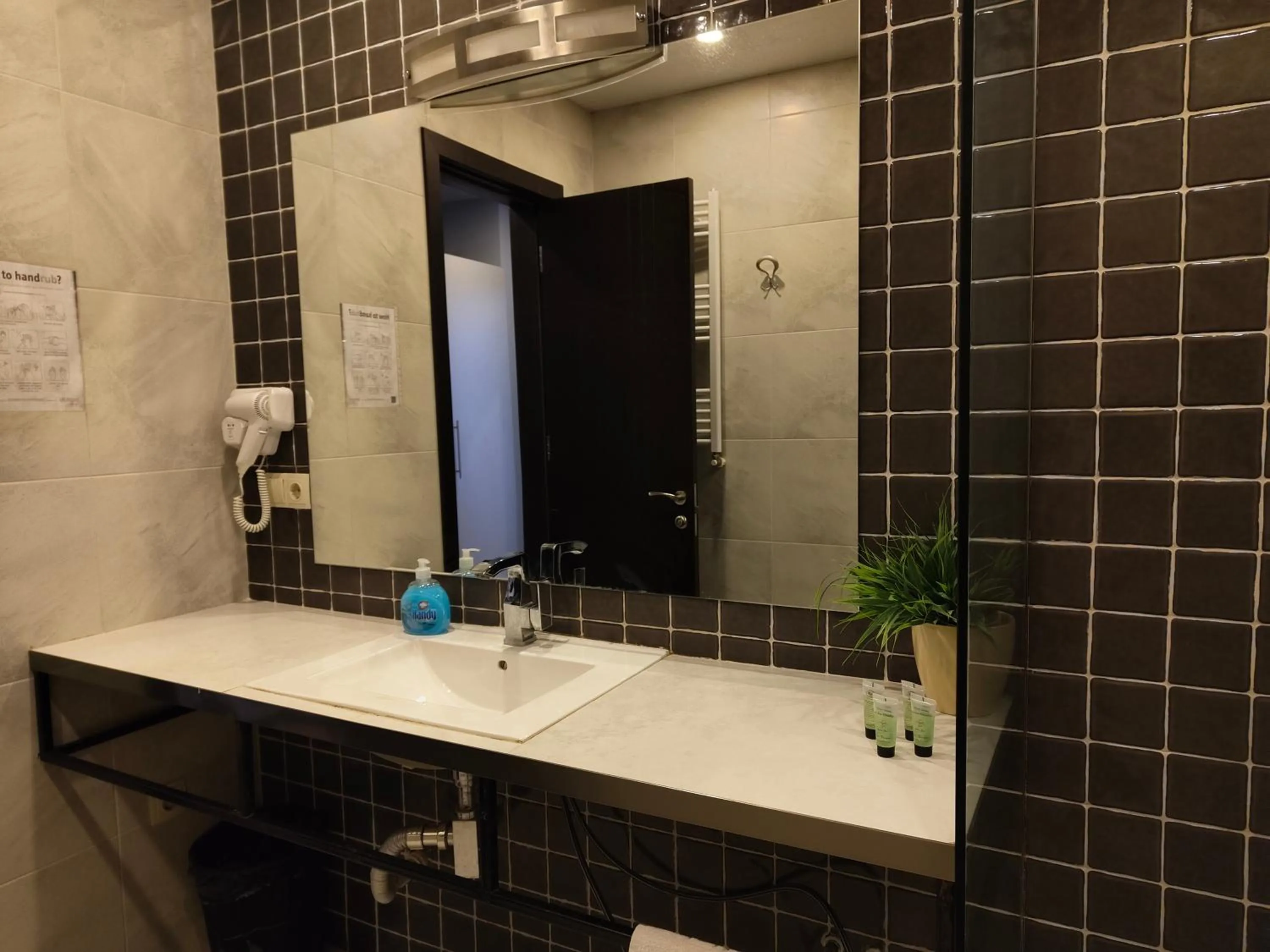 Bathroom in Sani Apart Hotel