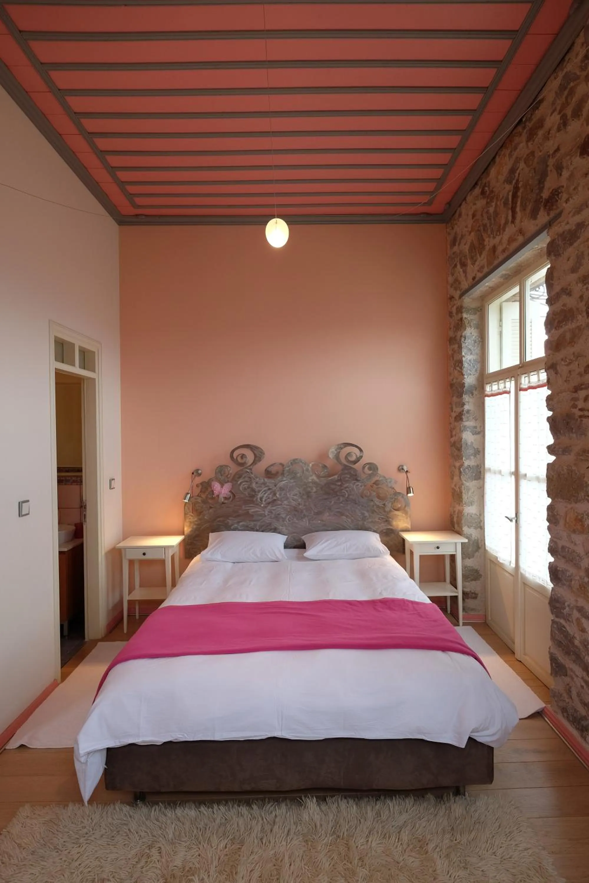 Bed in Kyriaki Guesthouse & Suites