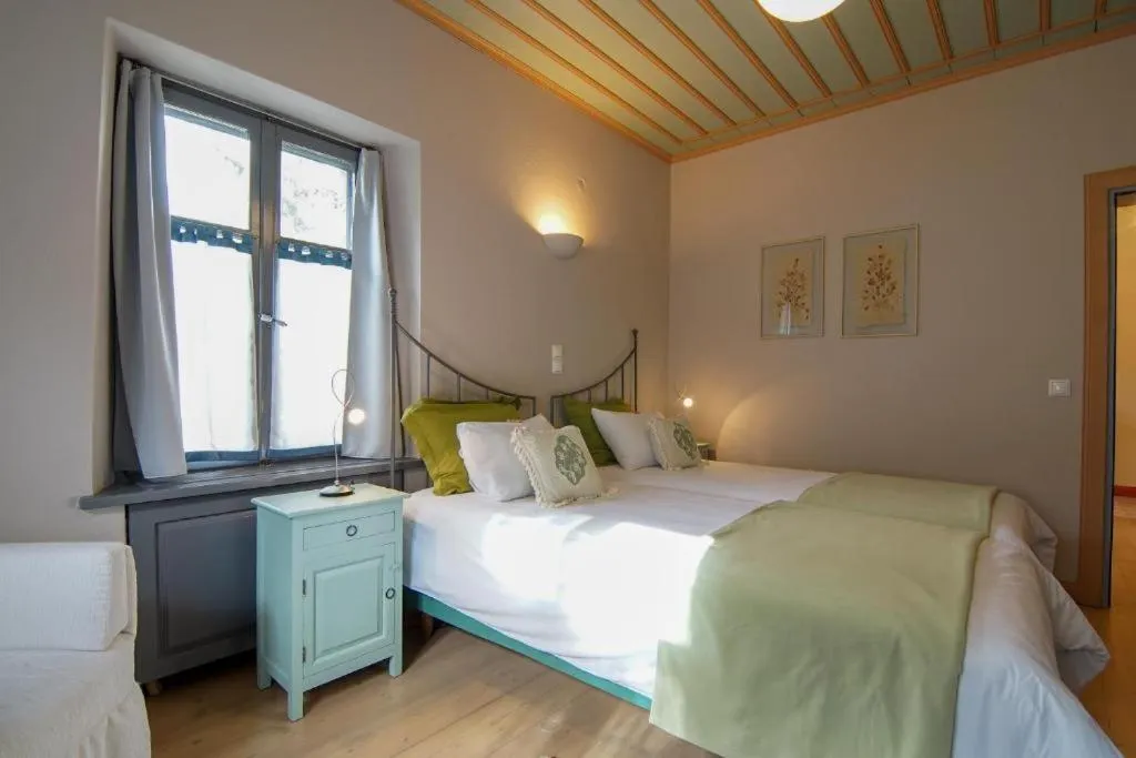 Bed in Kyriaki Guesthouse & Suites