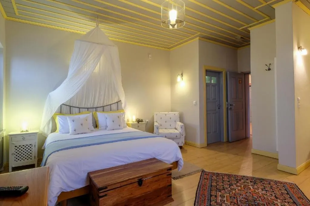 Bed in Kyriaki Guesthouse & Suites