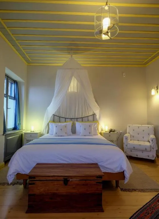 Bed in Kyriaki Guesthouse & Suites