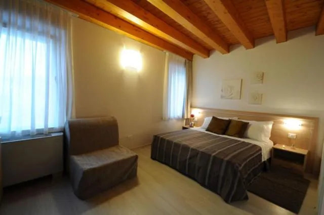 Photo of the whole room, Bed in Albergo Leon Bianco Gonars