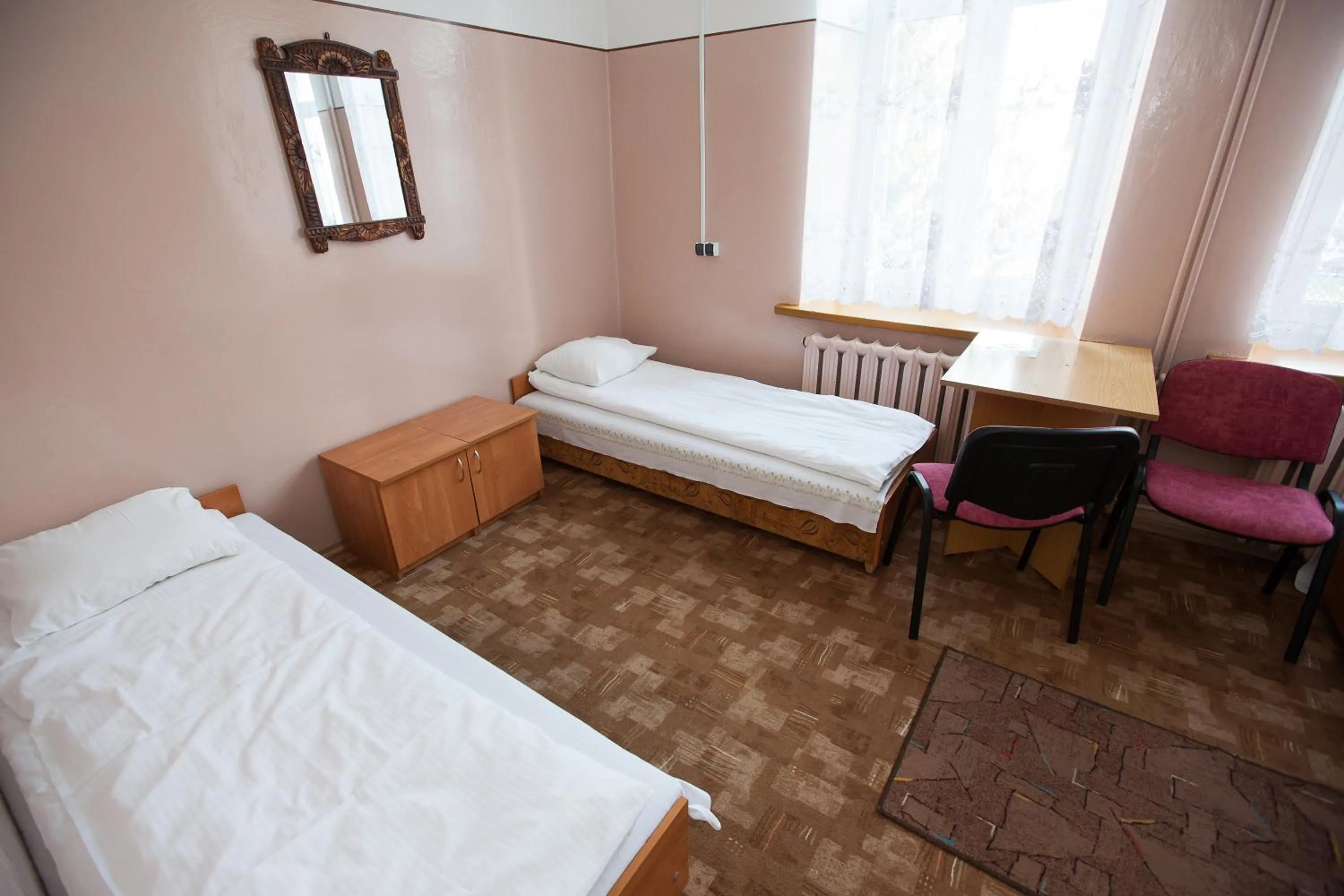 Photo of the whole room, Bed in Schronisko Młodzieżowe PTSM Matecznik