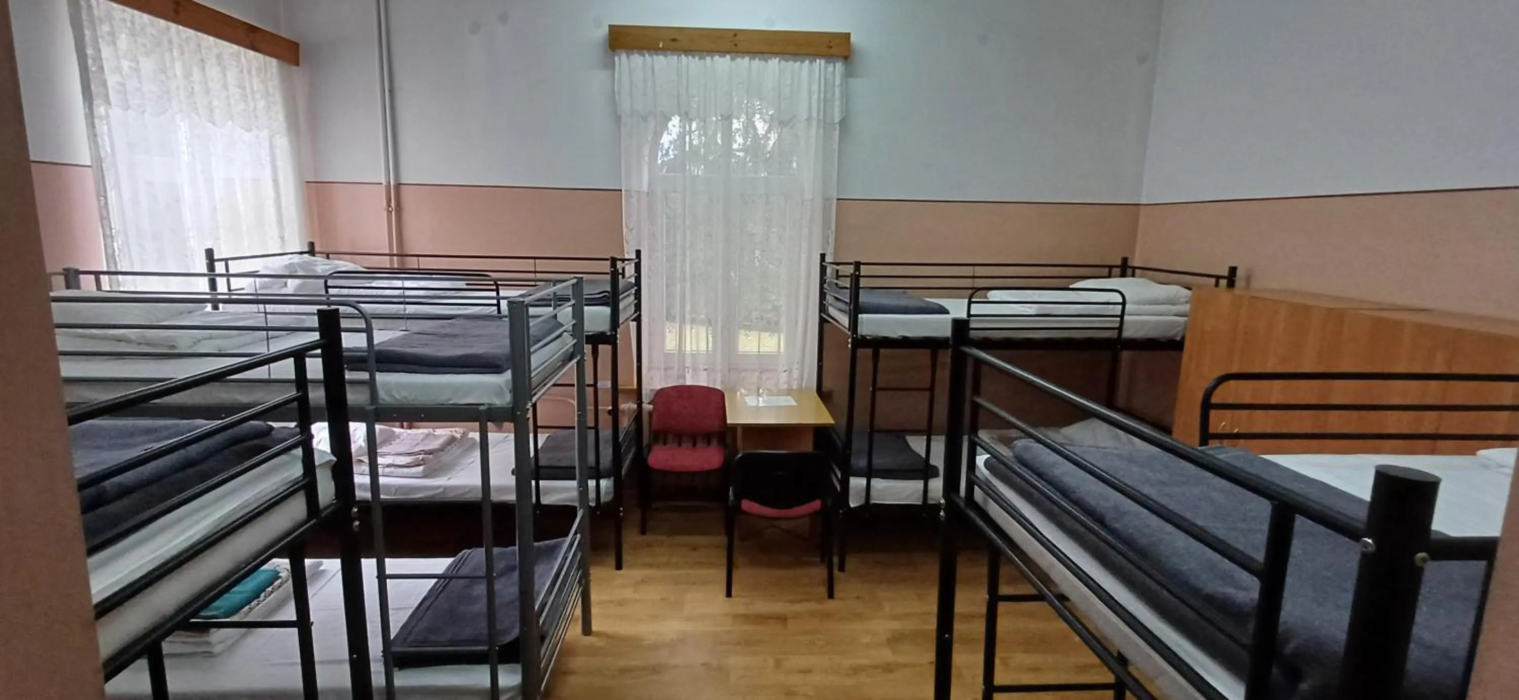 Photo of the whole room, Bed in Schronisko Młodzieżowe PTSM Matecznik