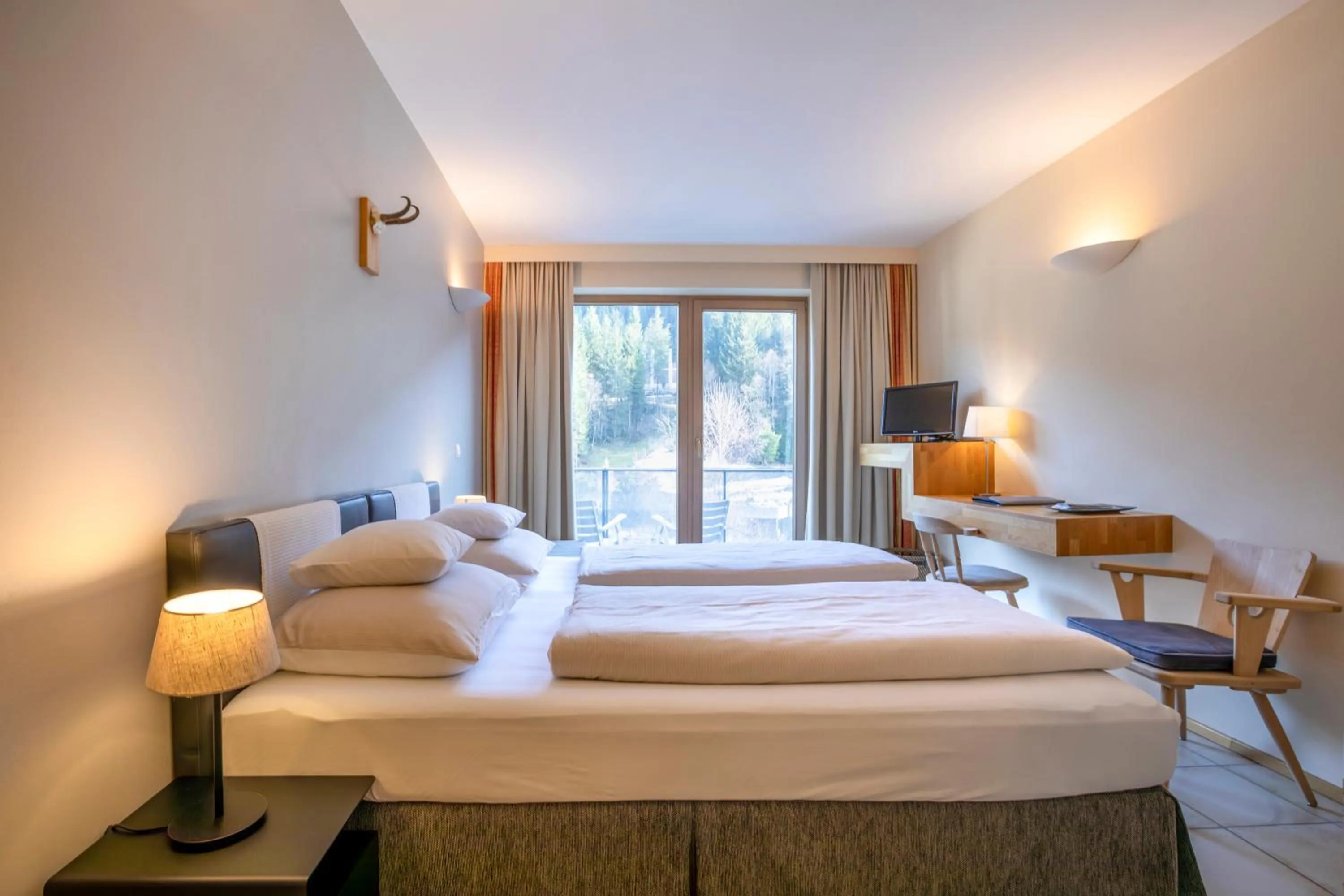 Bed in Hotel Edelweiss