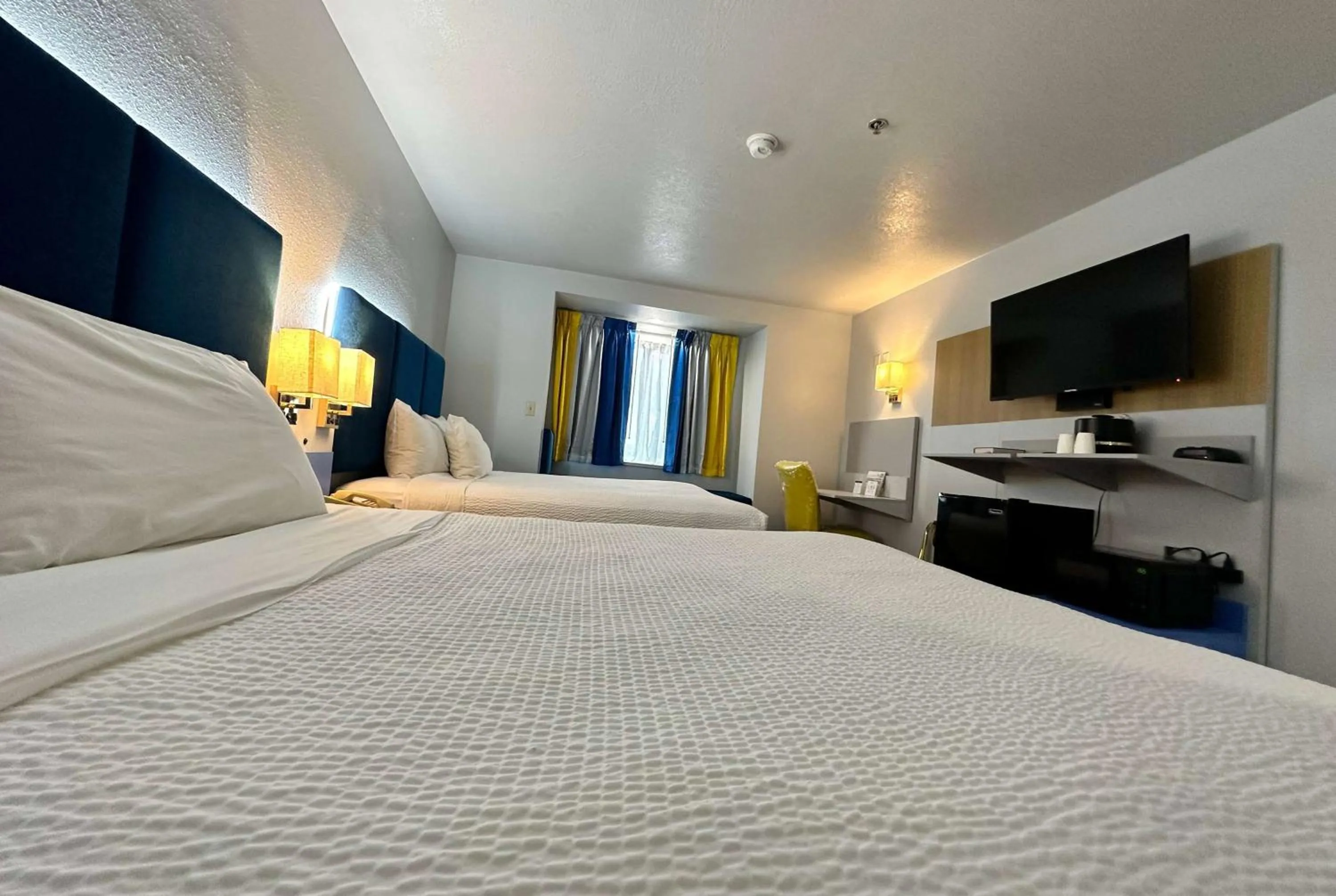 Photo of the whole room, Bed in Microtel Inn & Suites by Wyndham Gallup - PET FRIENDLY