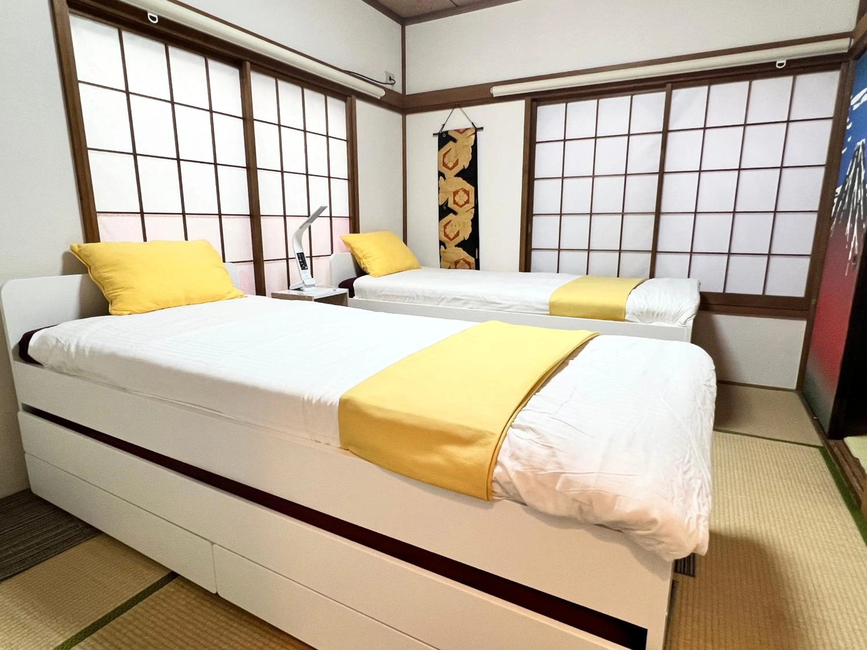 Bed in Ikebukuro no Yado detached house