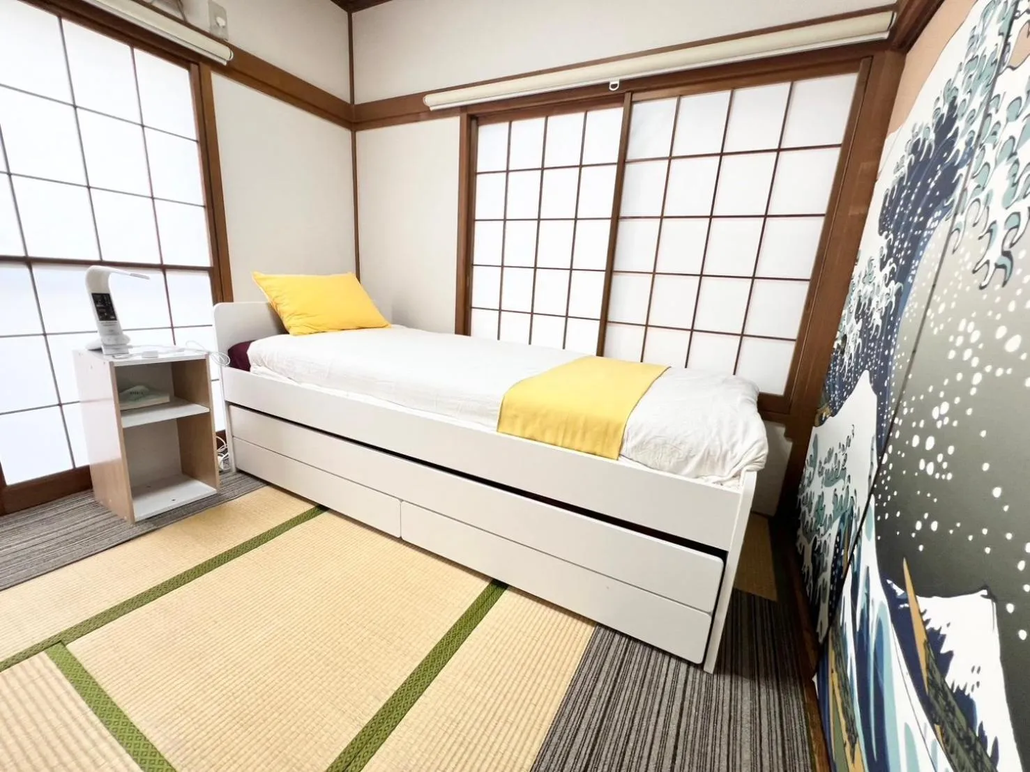 Bed in Ikebukuro no Yado detached house
