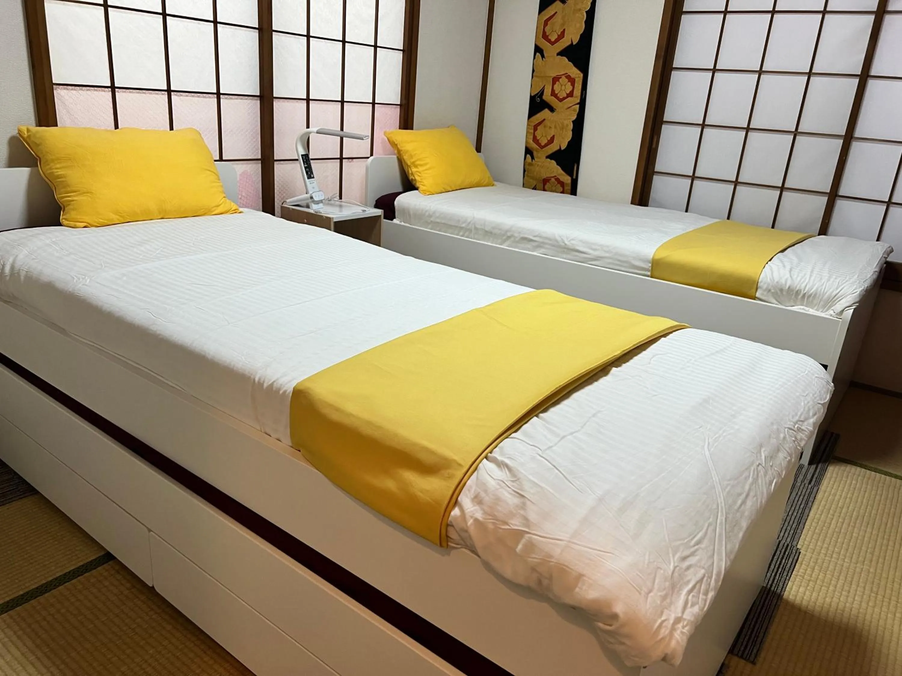 Bed in Ikebukuro no Yado detached house