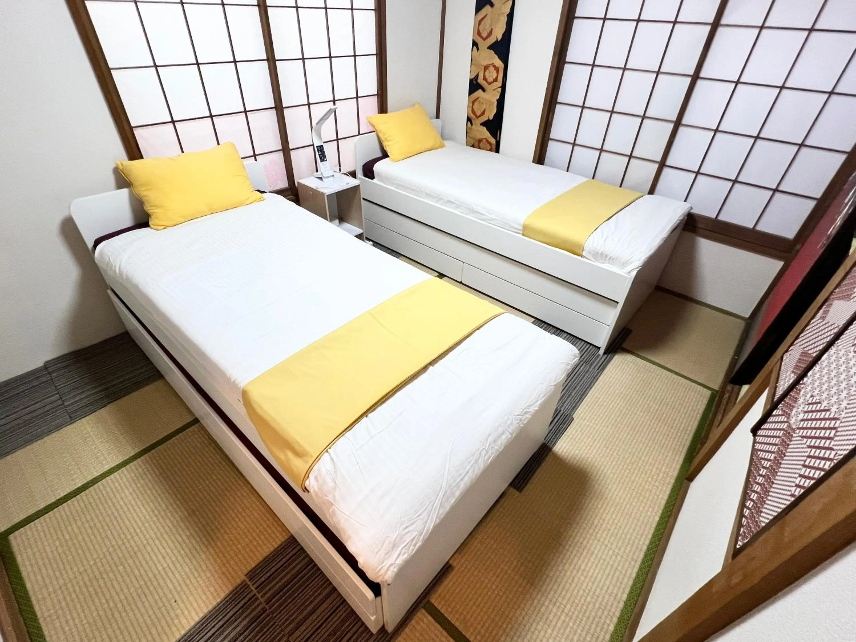 Bed in Ikebukuro no Yado detached house
