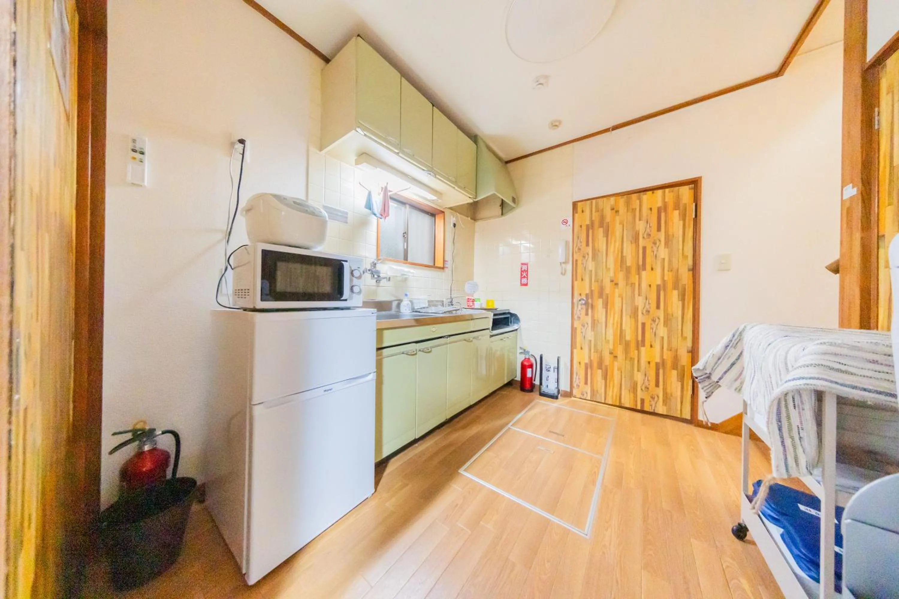 Bed in Ikebukuro no Yado detached house