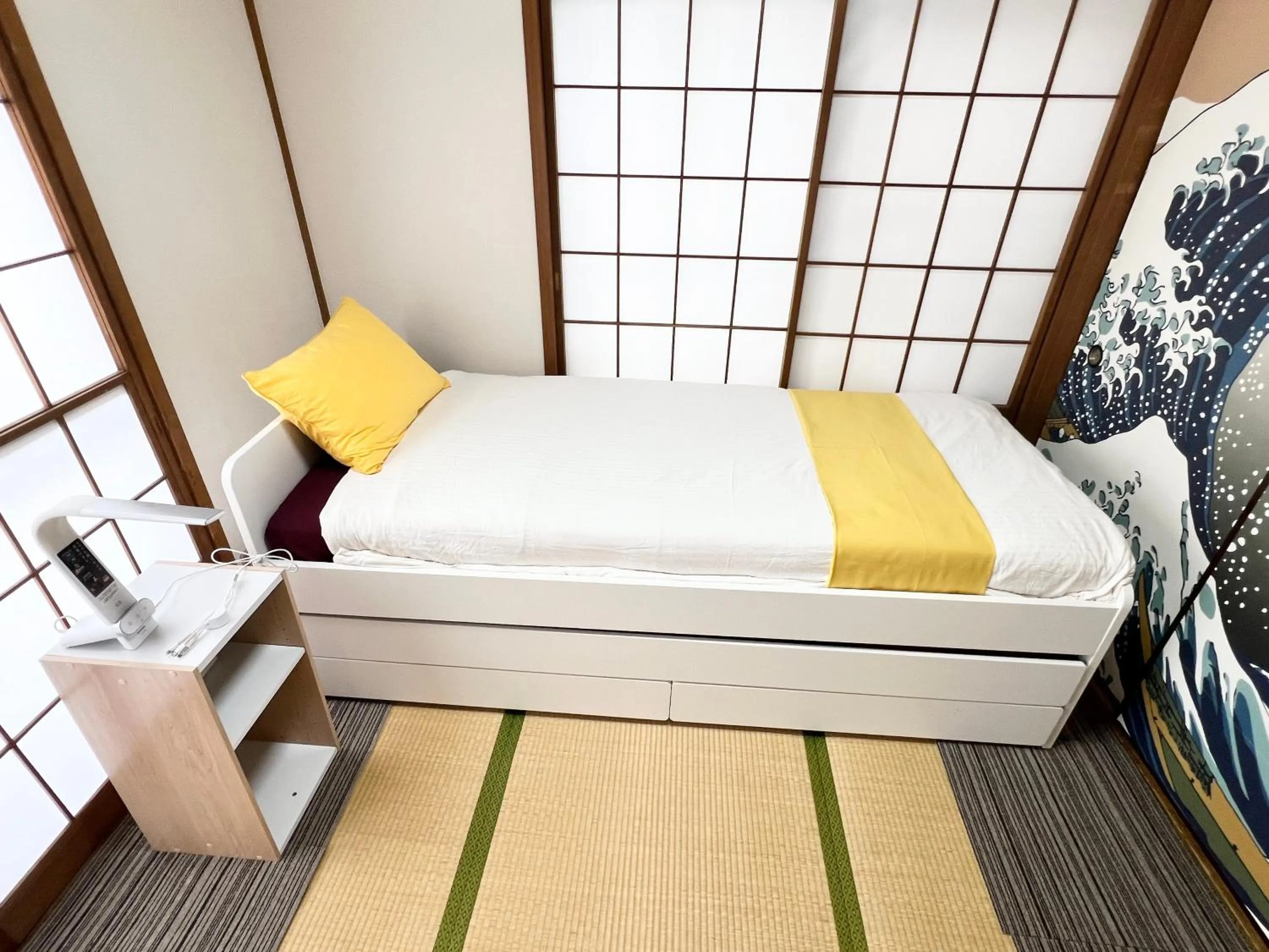 Bed in Ikebukuro no Yado detached house