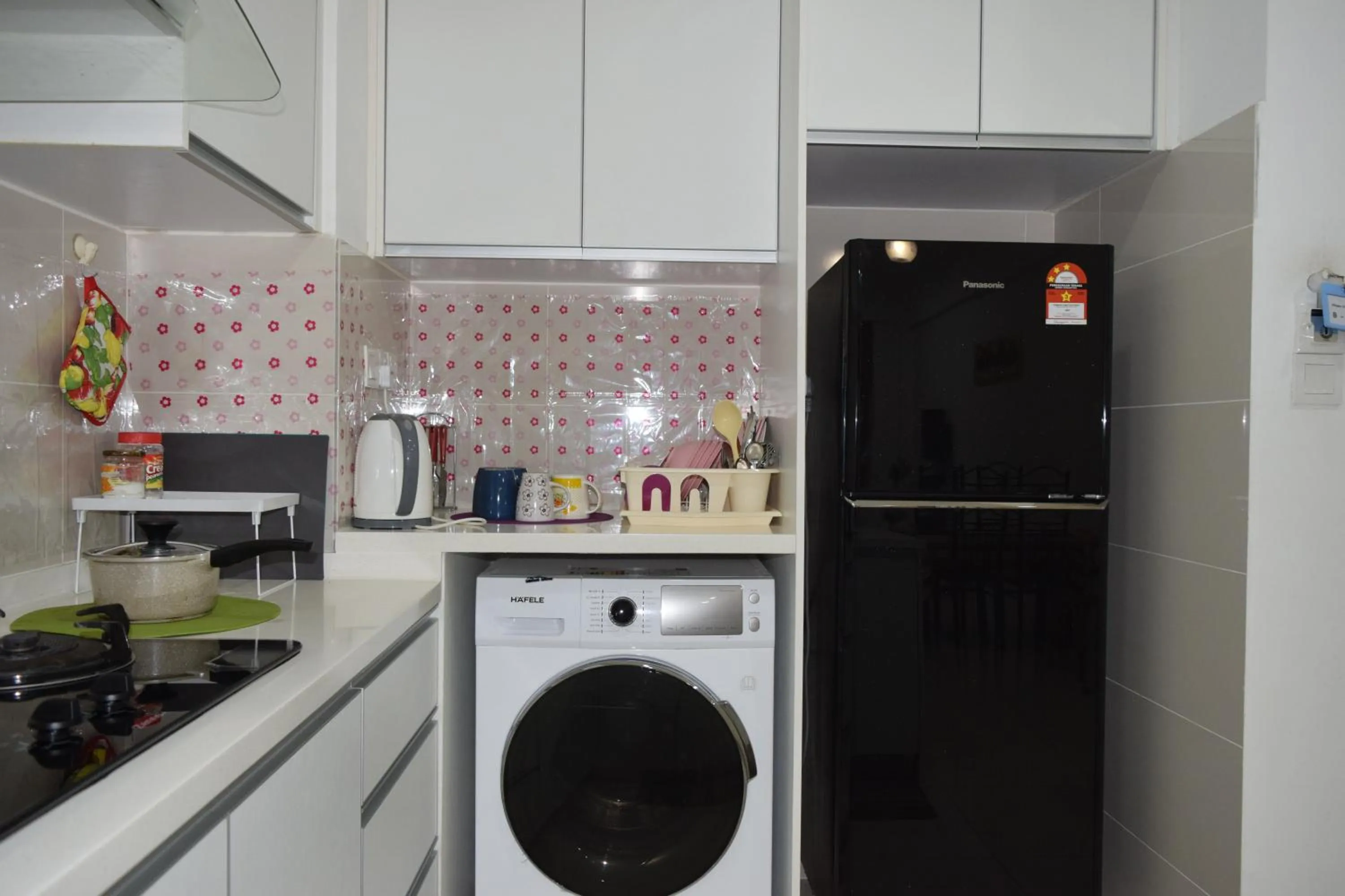 Kitchen or kitchenette in Sutera Avenue by Alawa Homes Kota Kinabalu