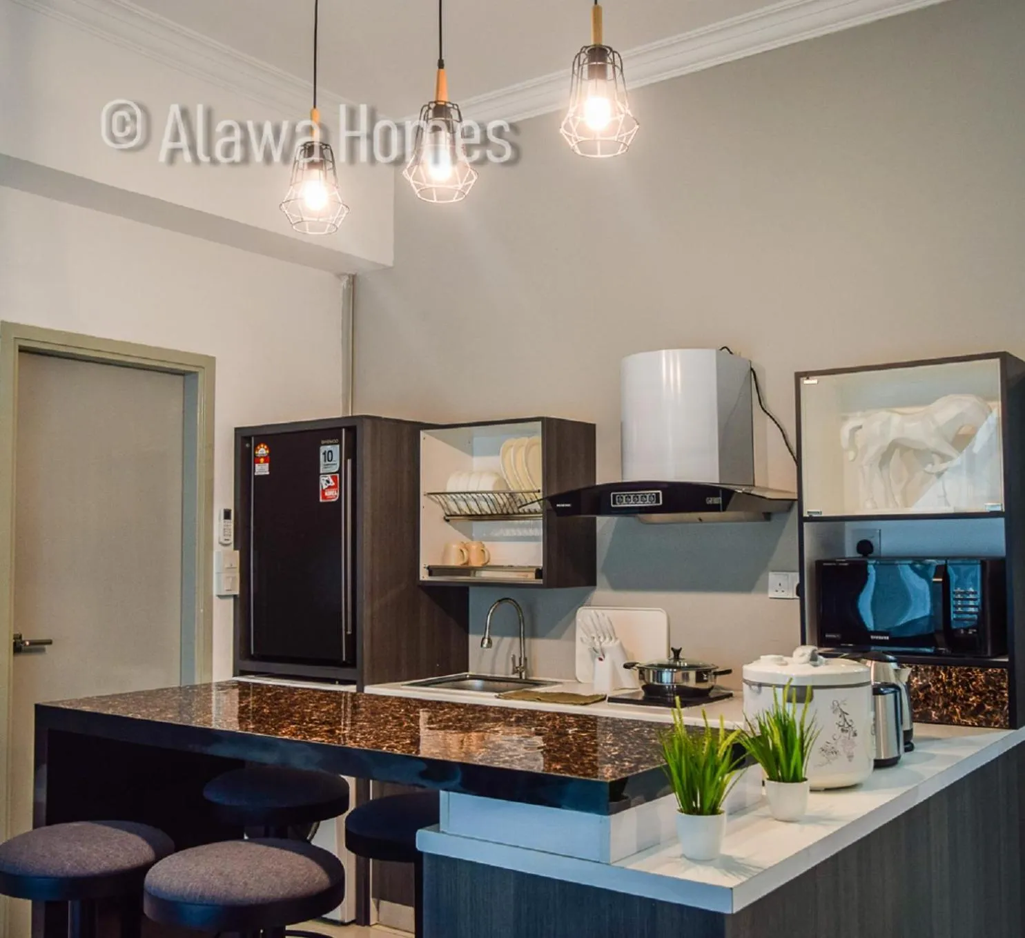 Kitchen or kitchenette in Sutera Avenue by Alawa Homes Kota Kinabalu