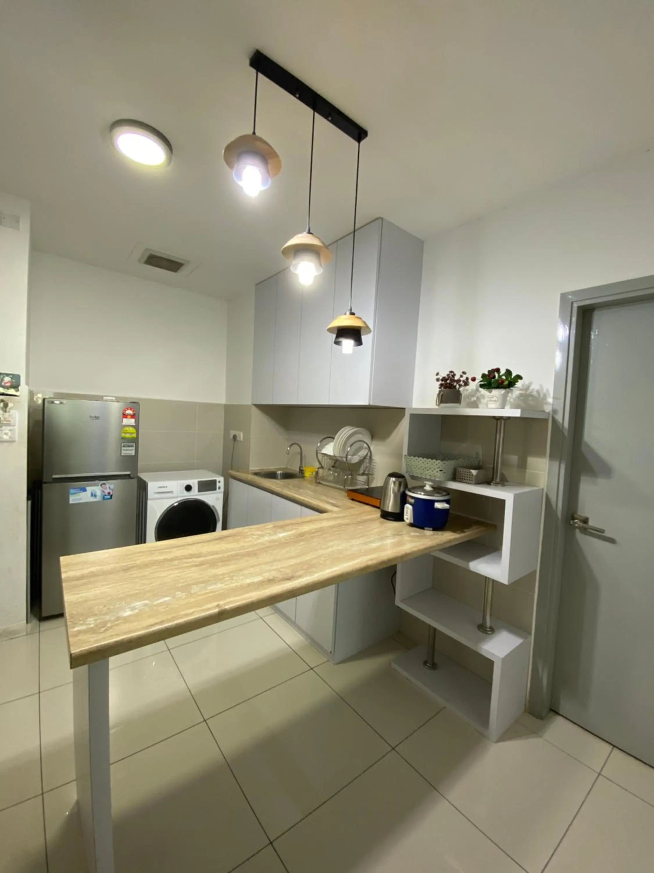 Kitchen or kitchenette in Sutera Avenue by Alawa Homes Kota Kinabalu