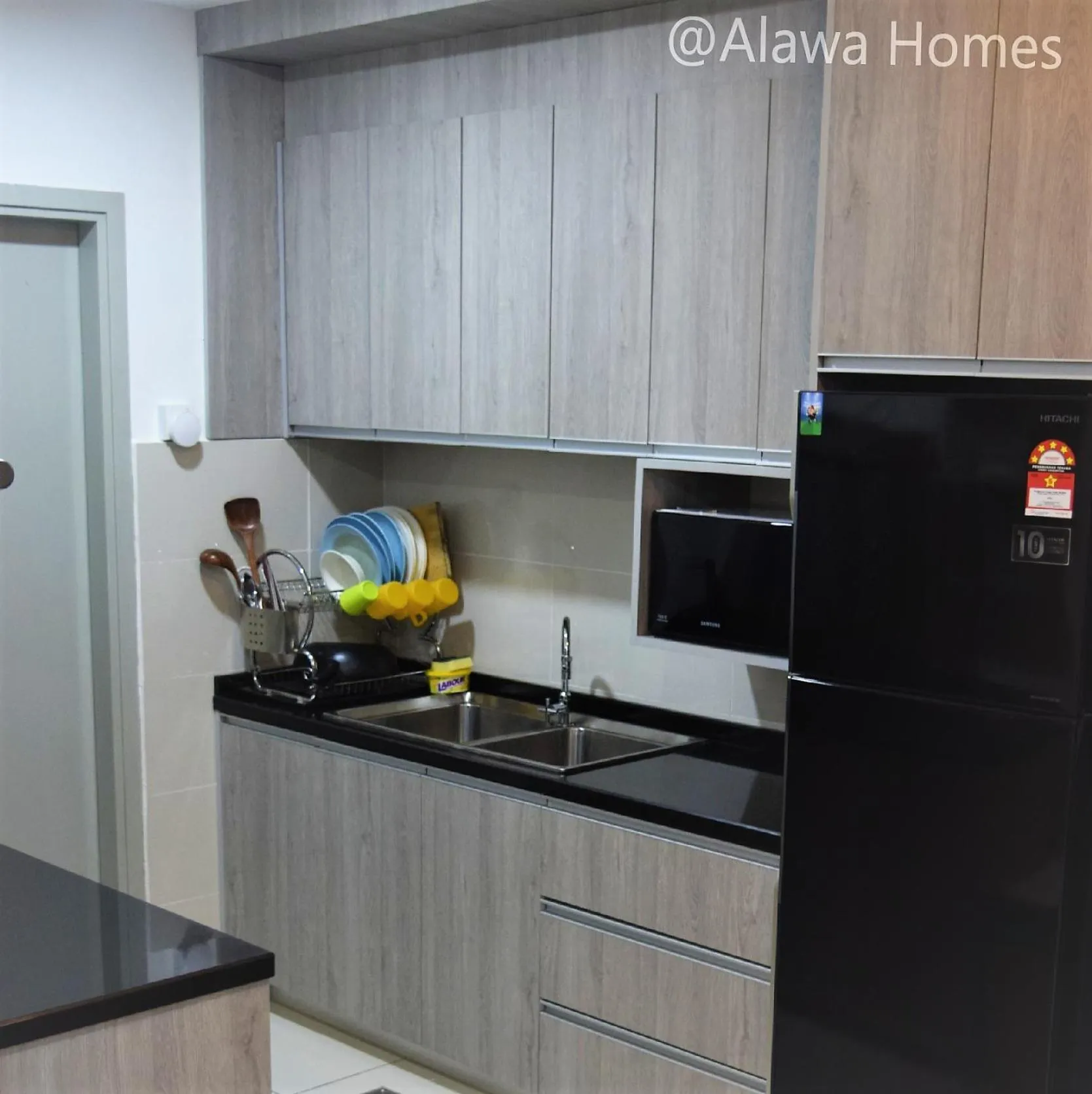 Kitchen or kitchenette in Sutera Avenue by Alawa Homes Kota Kinabalu