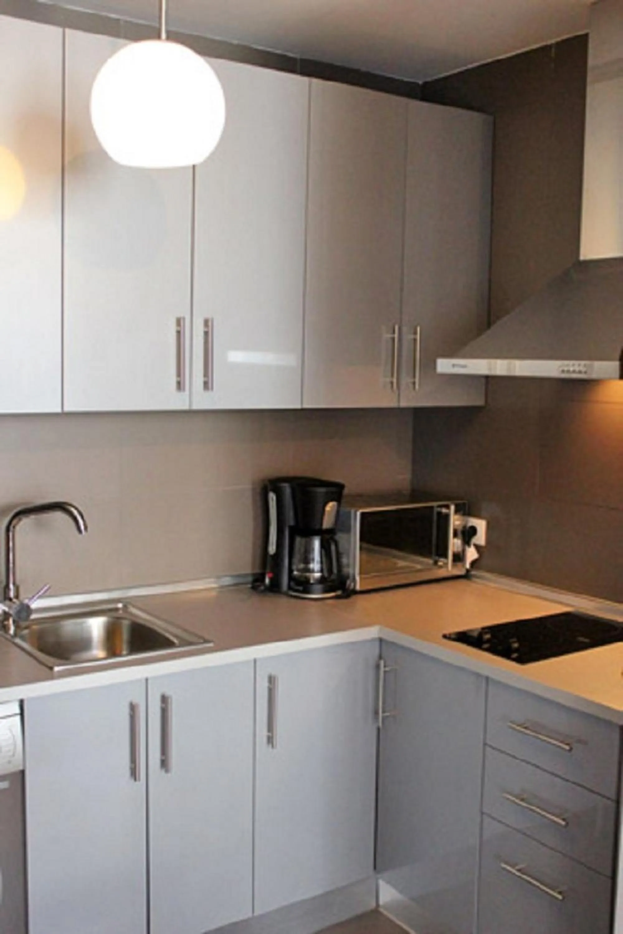 Kitchen or kitchenette in Apartamentos San Pablo