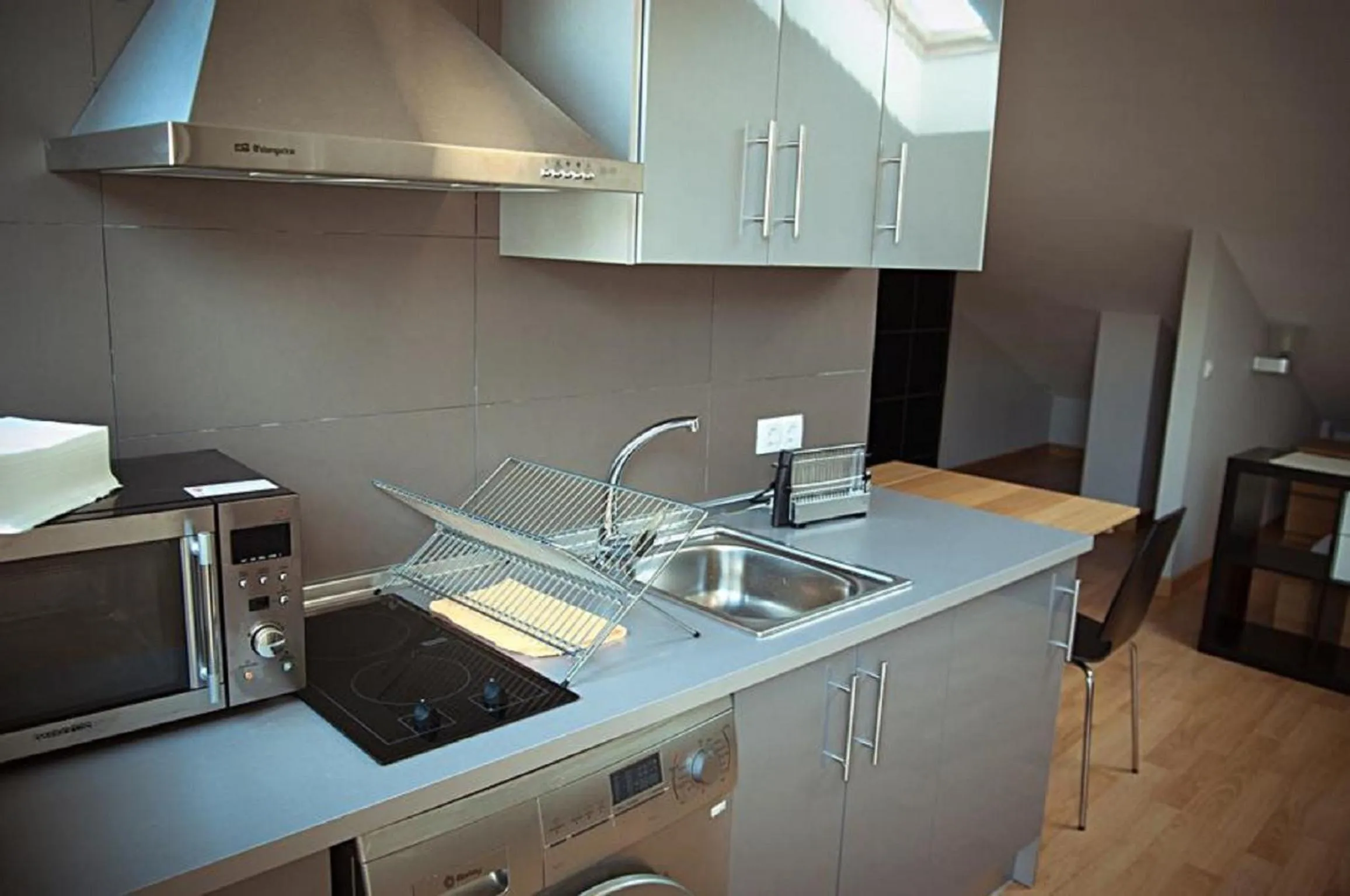 Kitchen or kitchenette in Apartamentos San Pablo