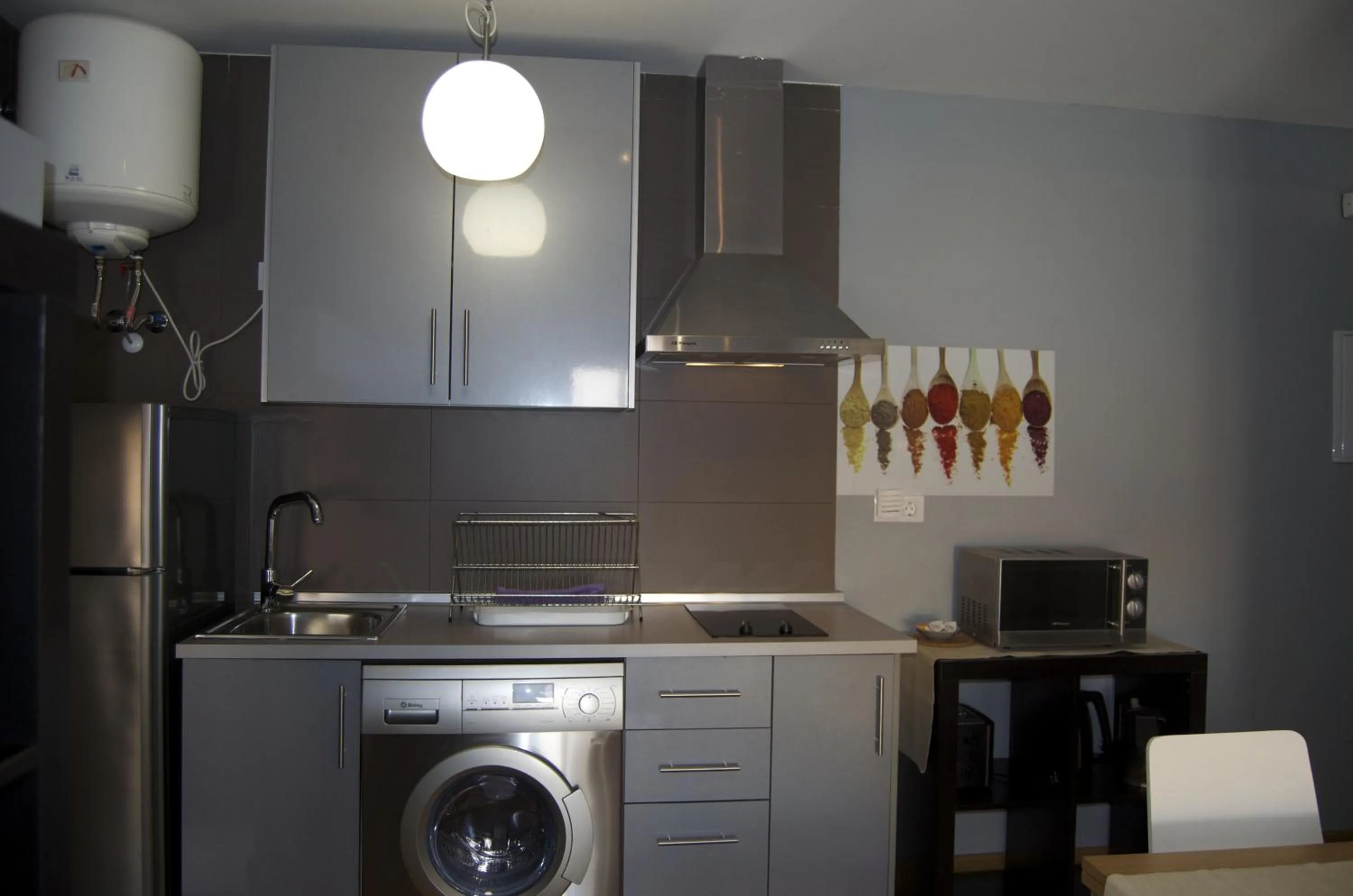 Kitchen or kitchenette in Apartamentos San Pablo