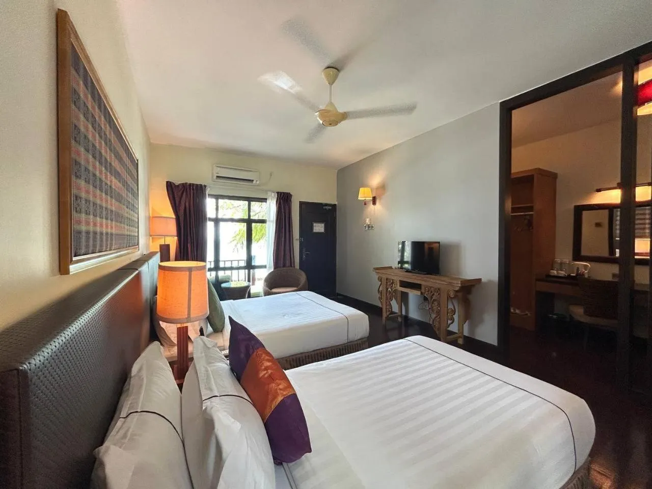Photo of the whole room, Bed in Tunamaya Beach & Spa Resort Tioman Island