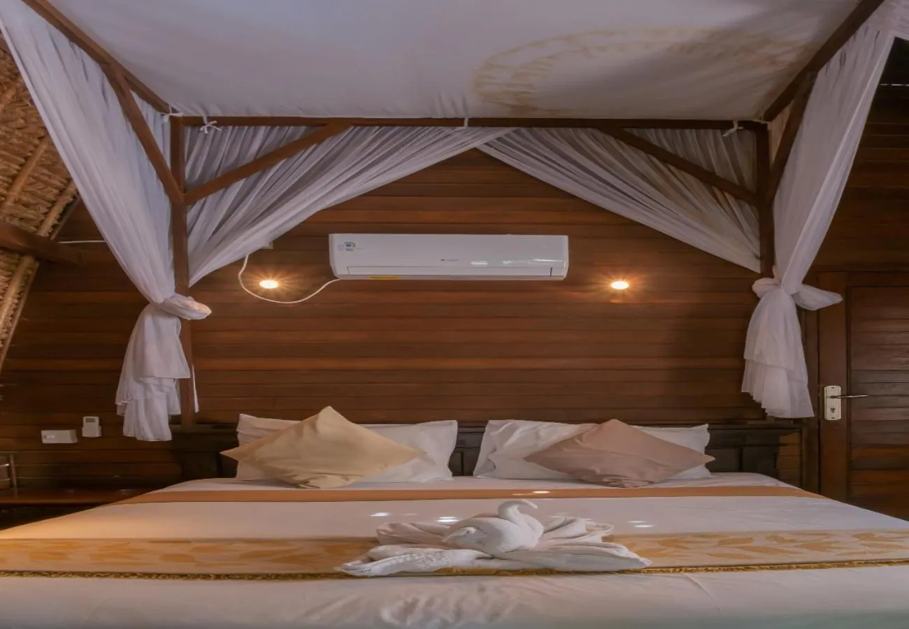 Bed in The Nichos Bungalows And Villas
