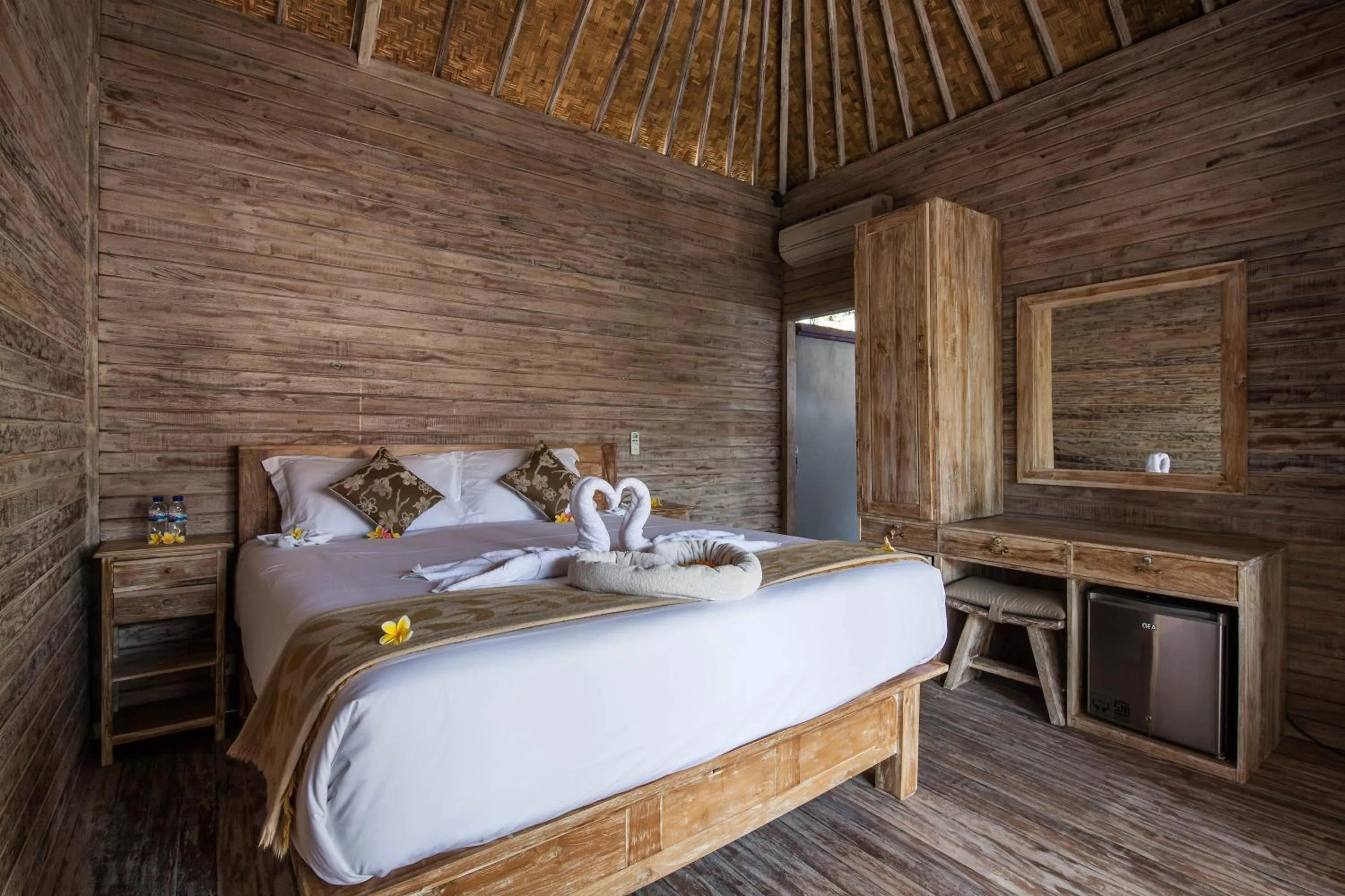 Bed in The Nichos Bungalows And Villas