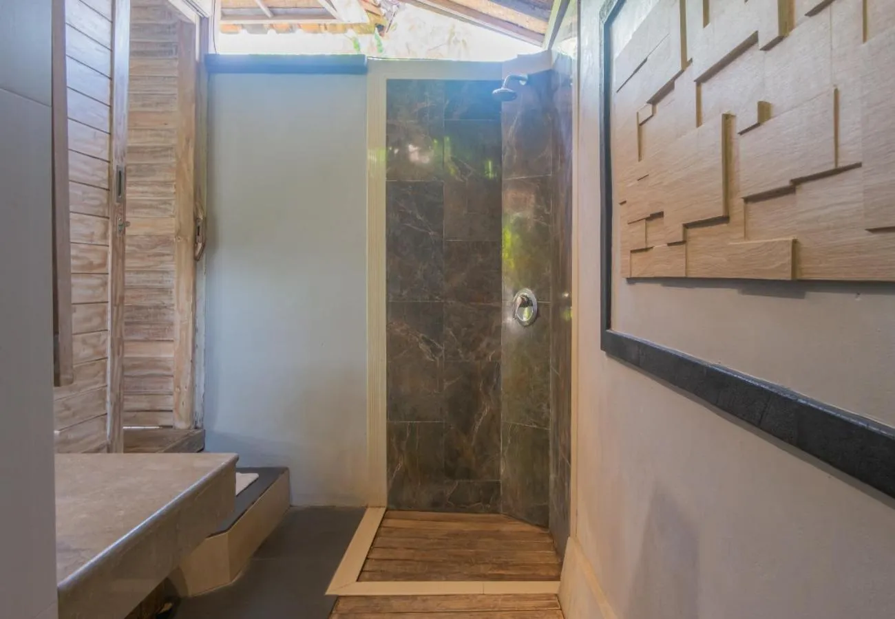 Shower in The Nichos Bungalows And Villas