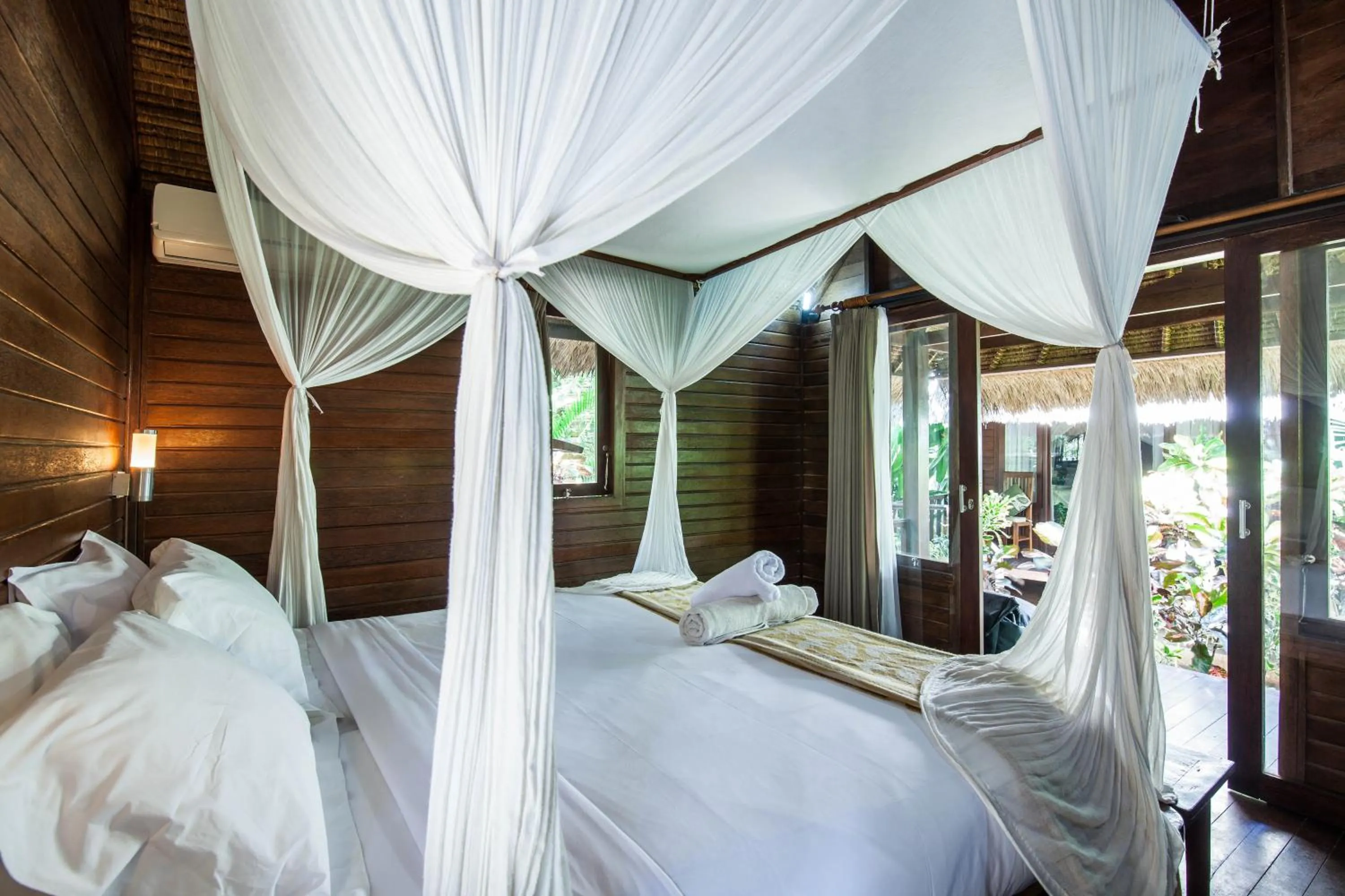 Bed in The Nichos Bungalows And Villas