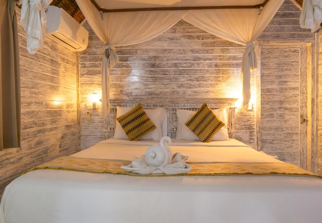 Bed in The Nichos Bungalows And Villas