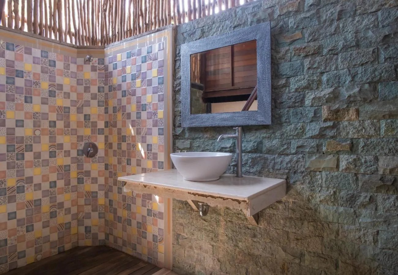 Bathroom in The Nichos Bungalows And Villas