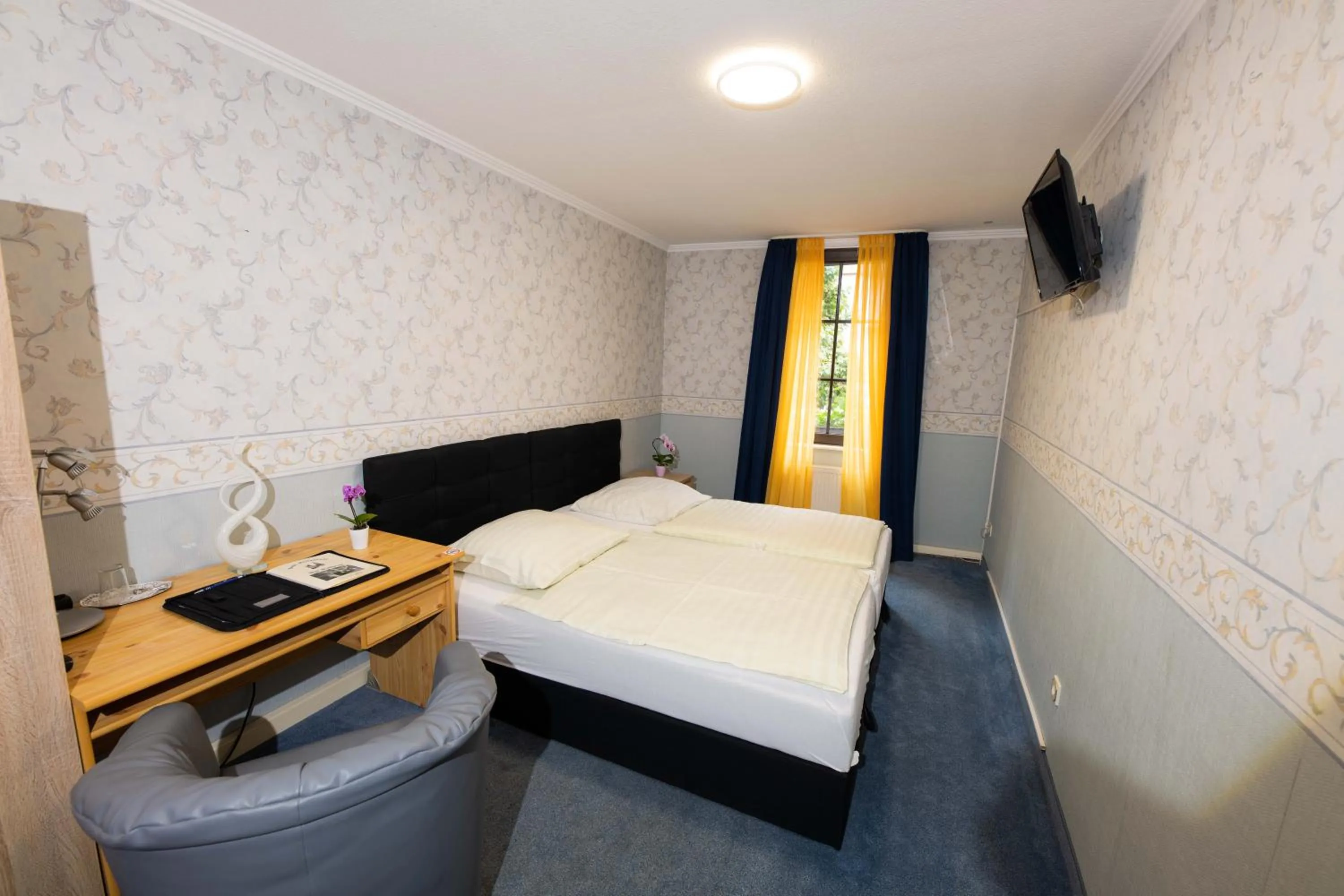 Bed in Hotel Am Rathaus