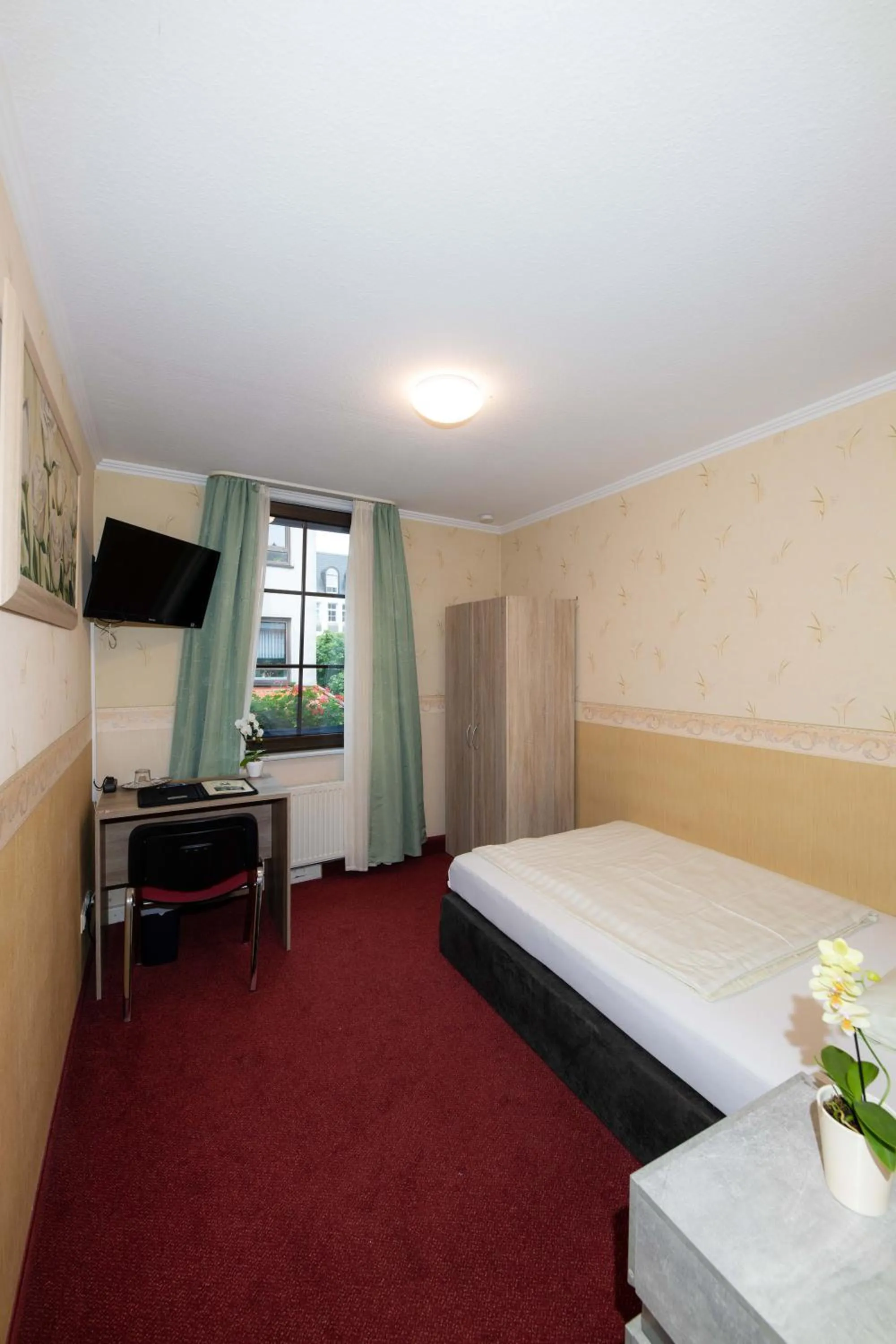 Bed in Hotel Am Rathaus