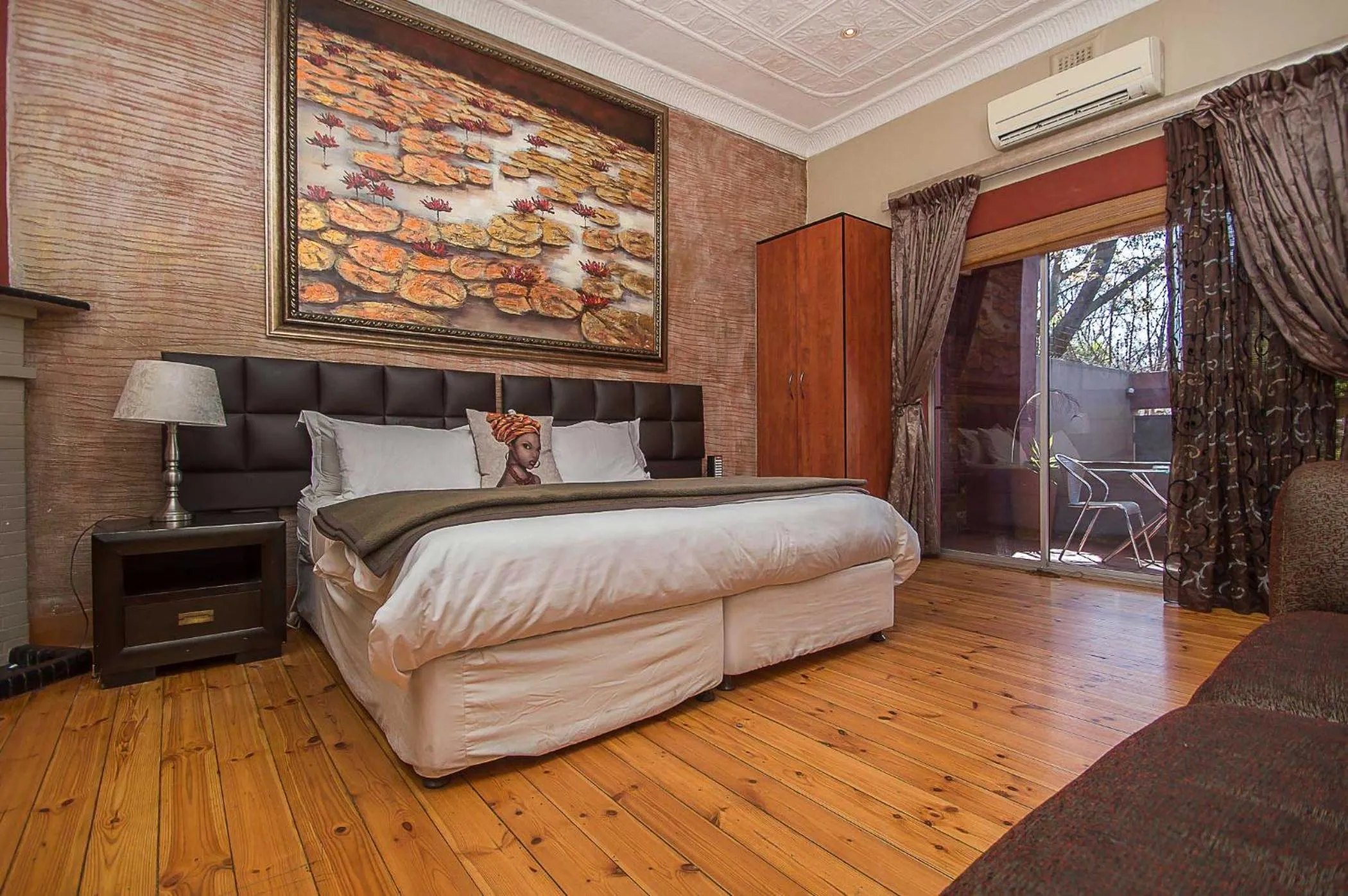 Bed in Saffron Guest House