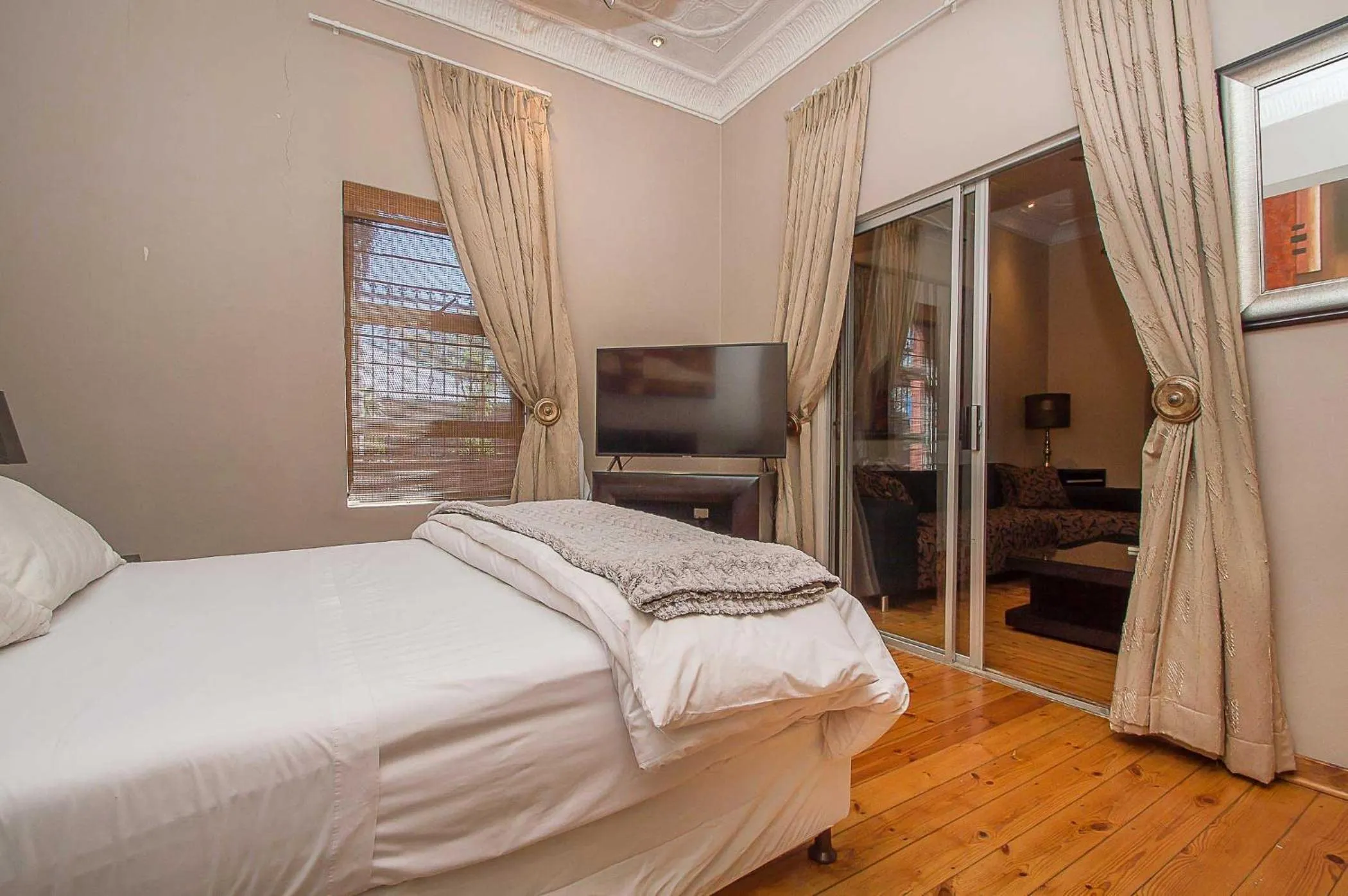 Bed in Saffron Guest House