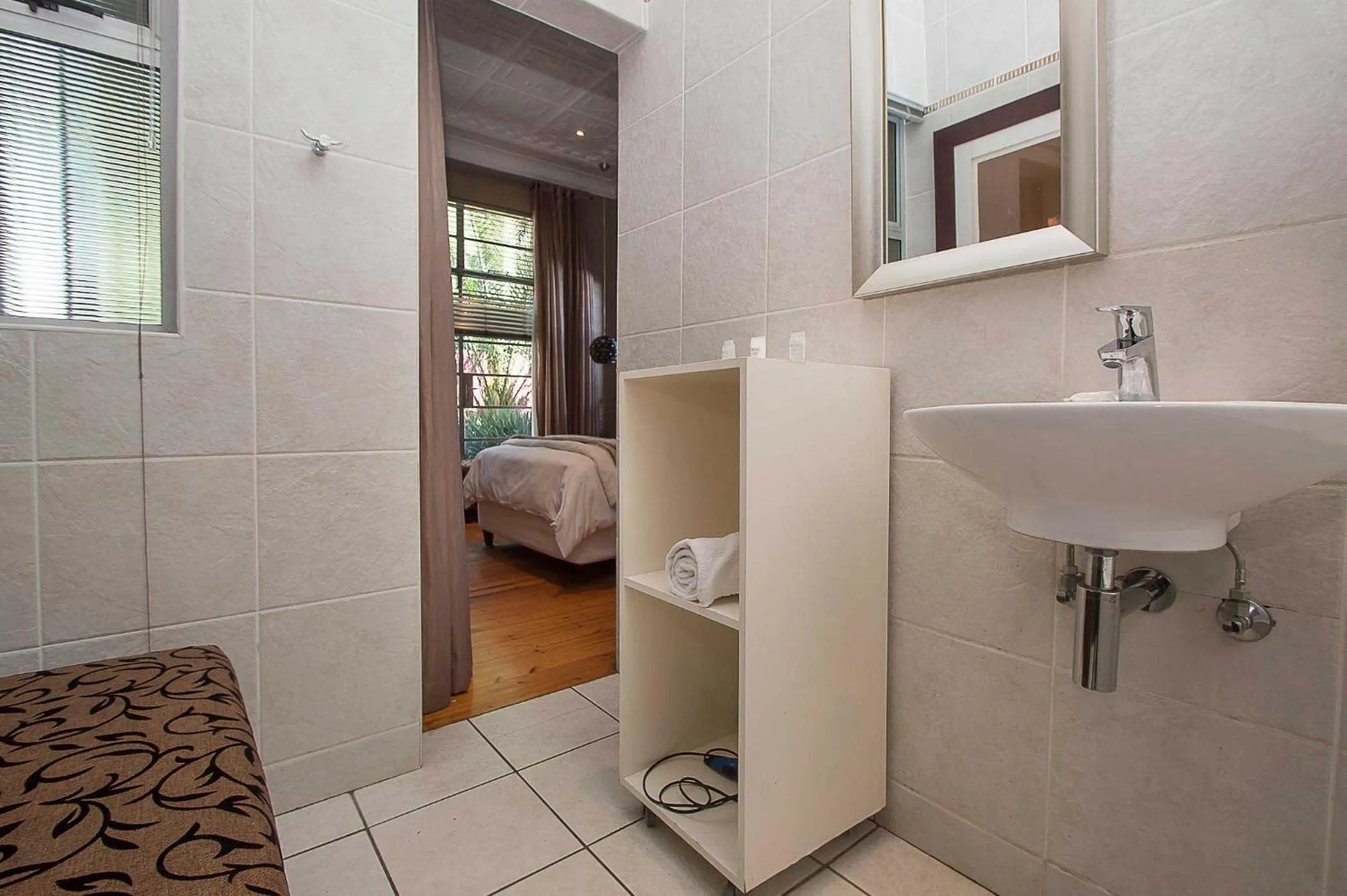 Bed in Saffron Guest House