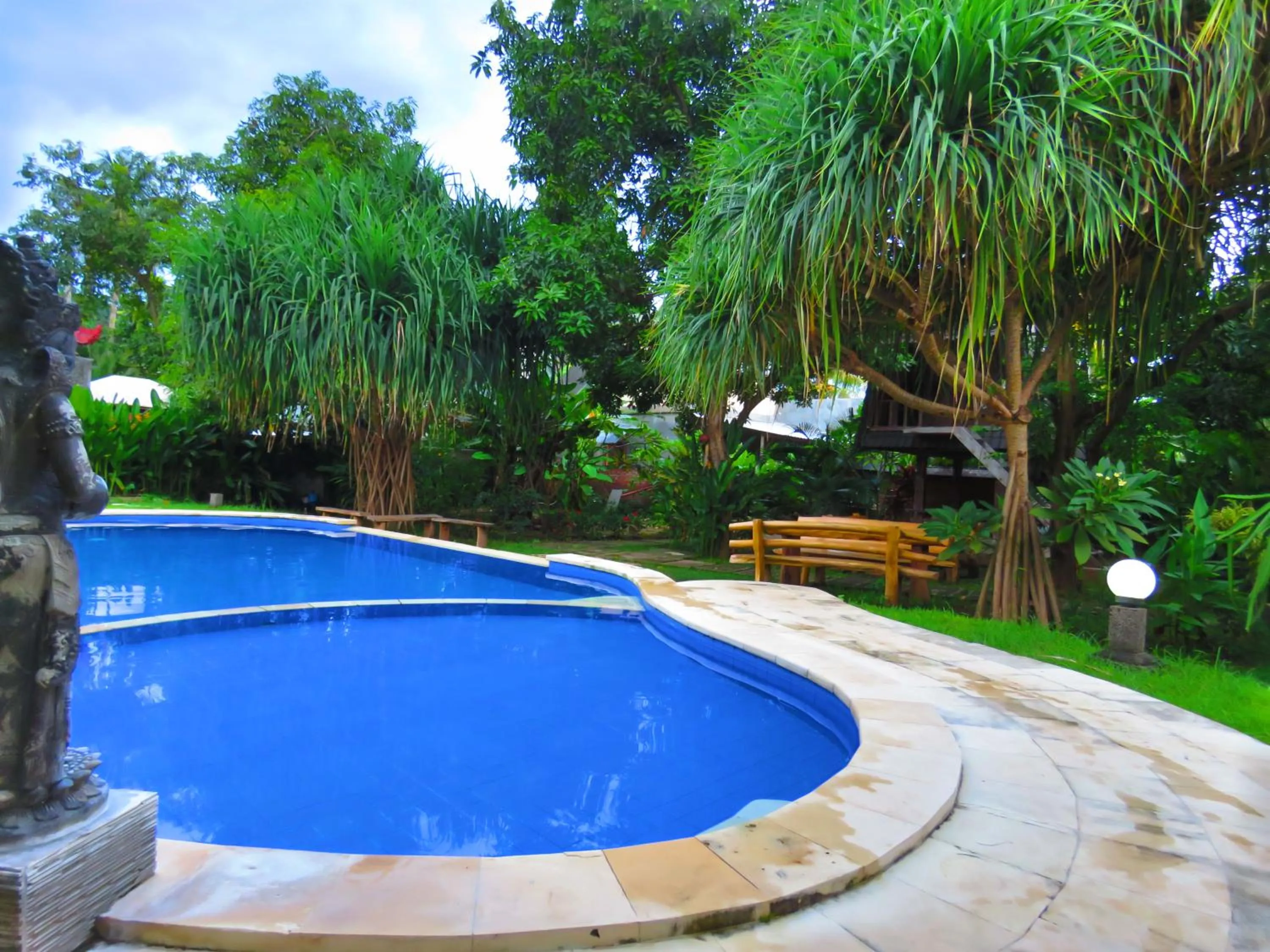 Swimming pool in Suka Sari Cottages