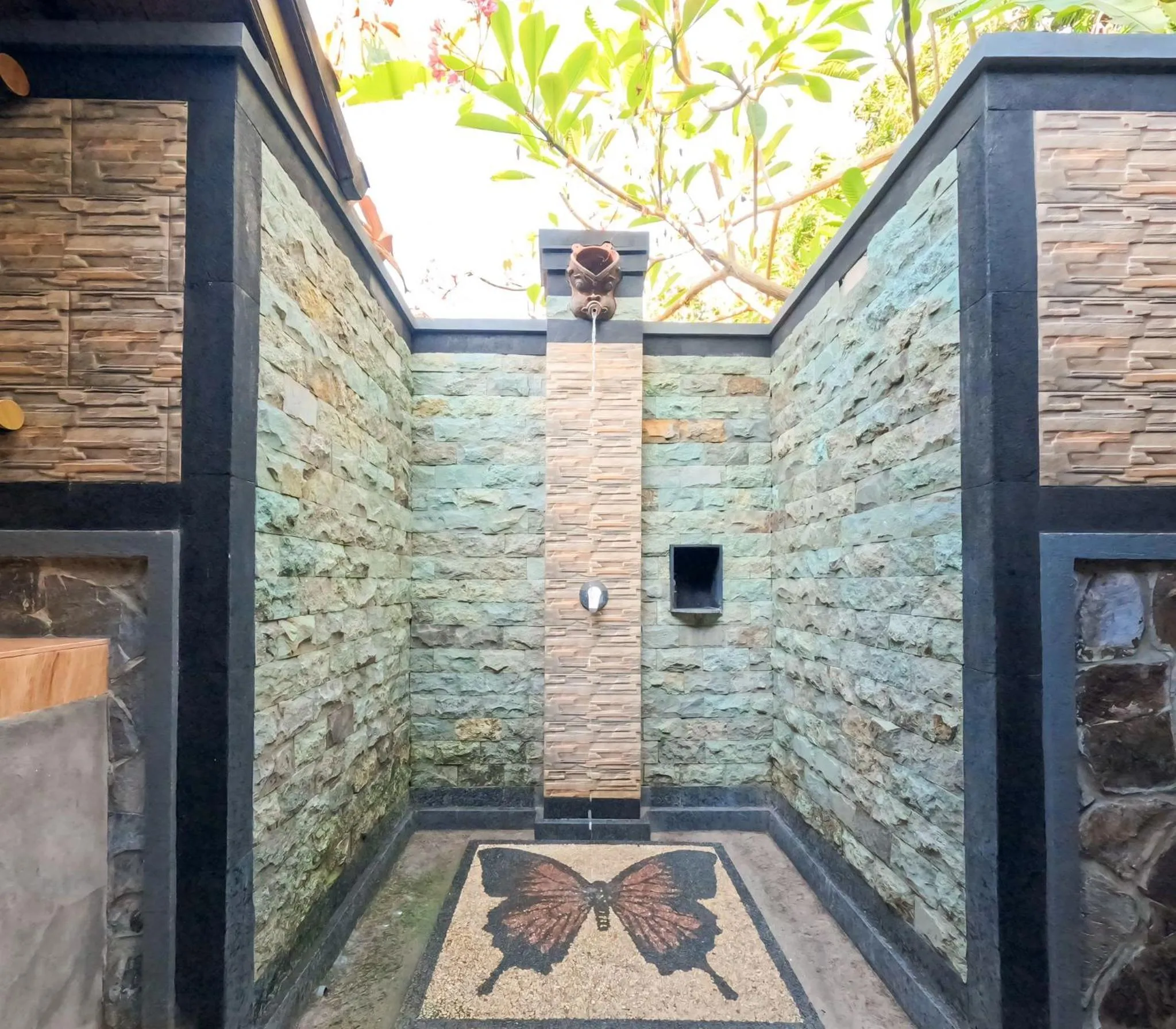 Shower in Suka Sari Cottages