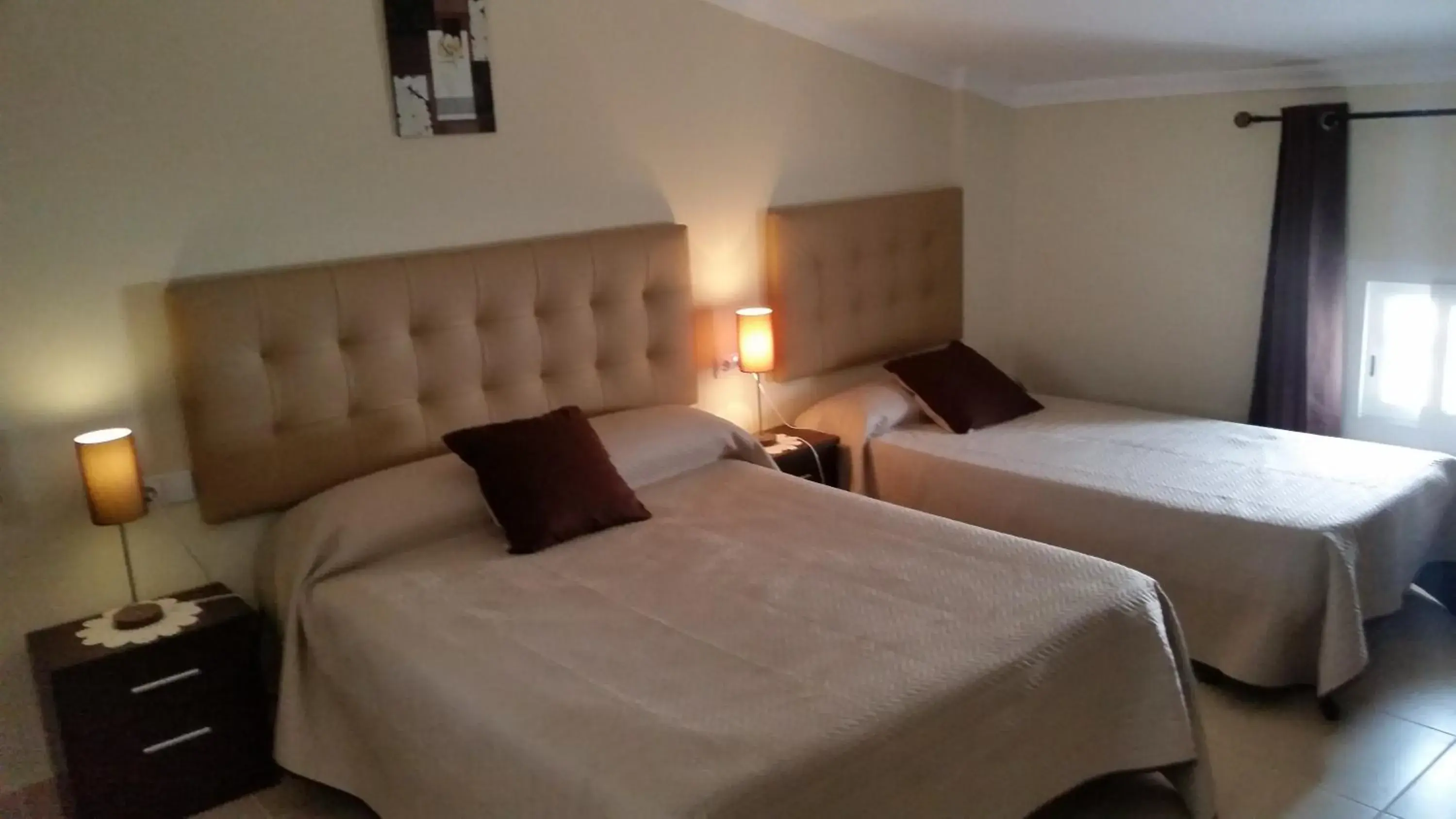 Triple Room in Hostal Málaga Triple Room in Hostal Málaga